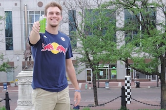 Justin Buchanan, now at student at IUPUI, relaxes recently at Monument Circle in downtown Indianapolis.