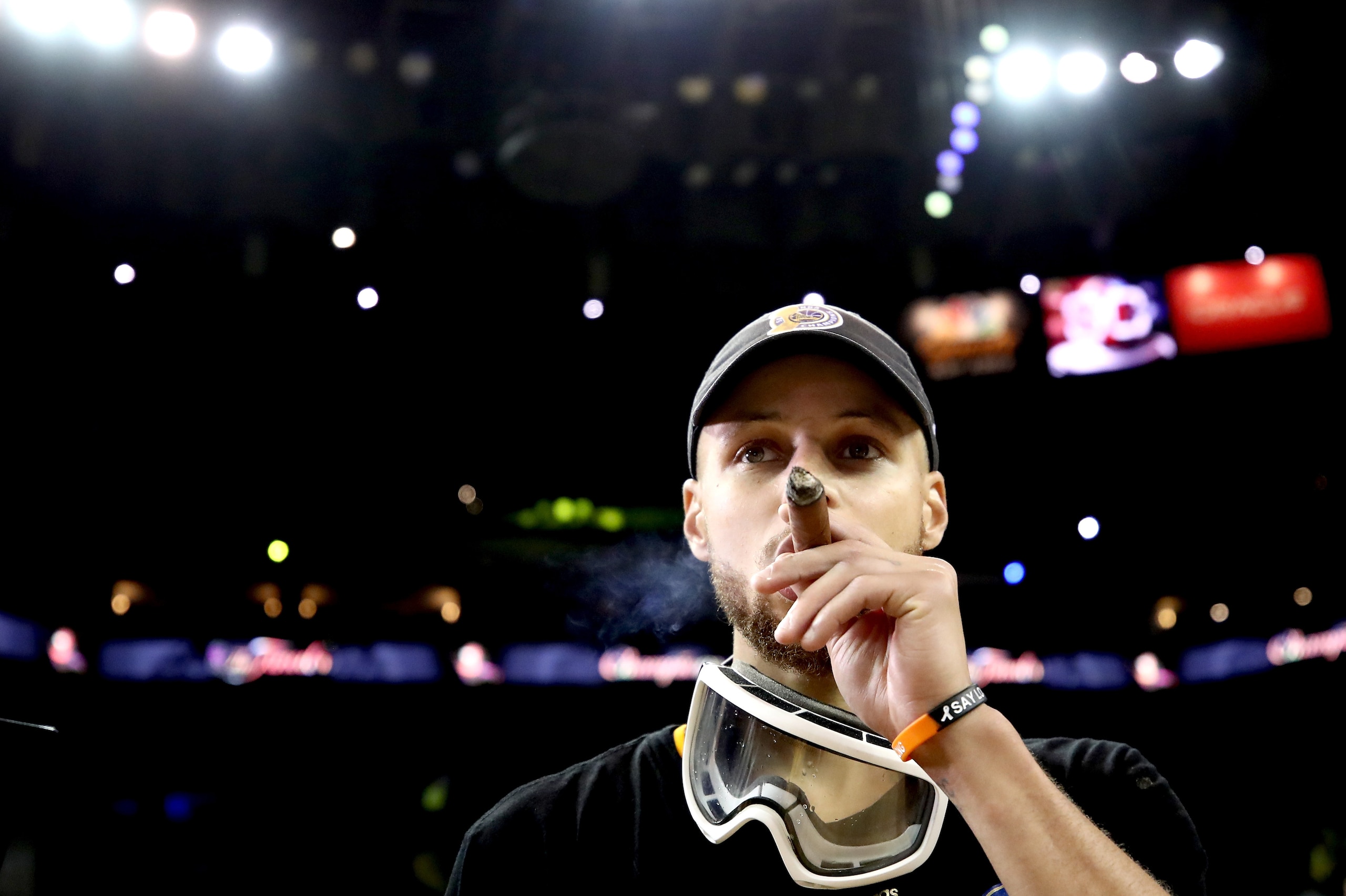 OAKLAND, CA - JUNE 12: Stephen Curry #30 of the Golden State Warriors smokes a cigar after defeating the Cleveland Cavaliers 129-120 in Game 5 to win the 2017 NBA Finals at ORACLE Arena on June 12, 2017 in Oakland, California. NOTE TO USER: User expressl OAKLAND, CA - JUNE 12: Stephen Curry #30 of the Golden State Warriors smokes a cigar after defeating the Cleveland Cavaliers 129-120 in Game 5 to win the 2017 NBA Finals at ORACLE Arena on June 12, 2017 in Oakland, California. NOTE TO USER: User expressl