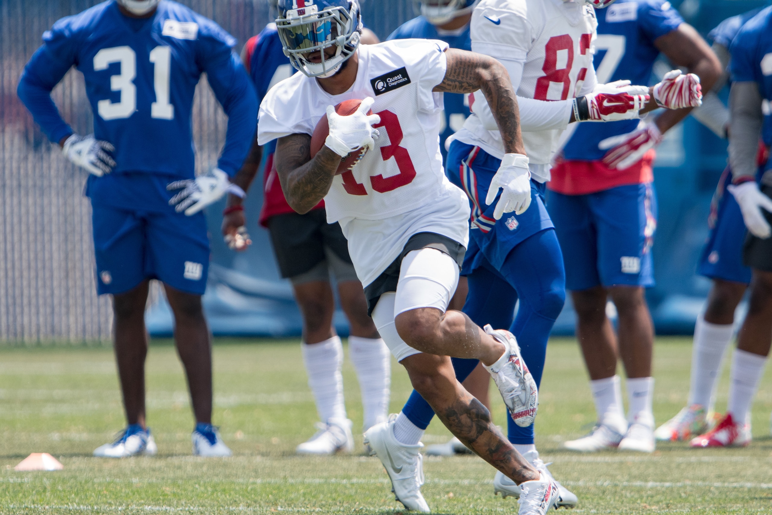 Jun 13, 2017; East Rutherford, NJ, USA; New York Giants wide receiver Odell Beckham (13) runs with ball during mini camp at Quest Diagnostics Training Center. Mandatory Credit: William Hauser-USA TODAY Sports