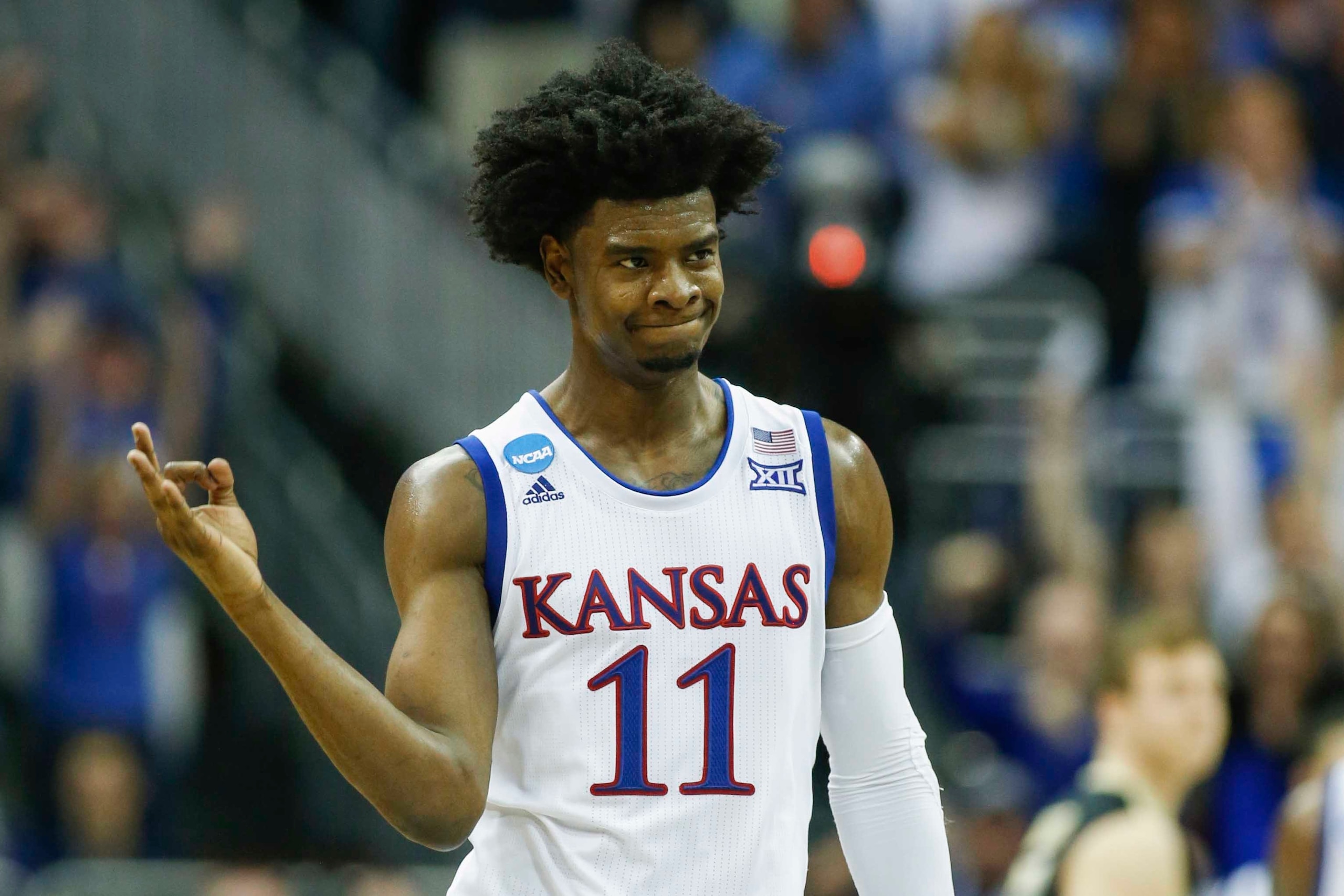 Mar 23, 2017; Kansas City, MO, USA; Kansas Jayhawks guard Josh Jackson (11) reacts during the second half in the semifinals of the midwest Regional of the 2017 NCAA Tournament at Sprint Center. Mandatory Credit: Jay Biggerstaff-USA TODAY Sports