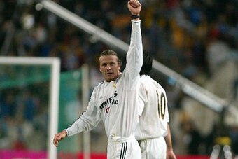 BARCELONA, SPAIN:  Madrid's David Beckham raises his arm after scoring a goal against Zaragoza during a King Cup final soccer match in Barcelona 17 March, 2004. (AFP PHOTO/CESAR RANGEL)  (Photo credit should read CESAR RANGEL/AFP/Getty Images)