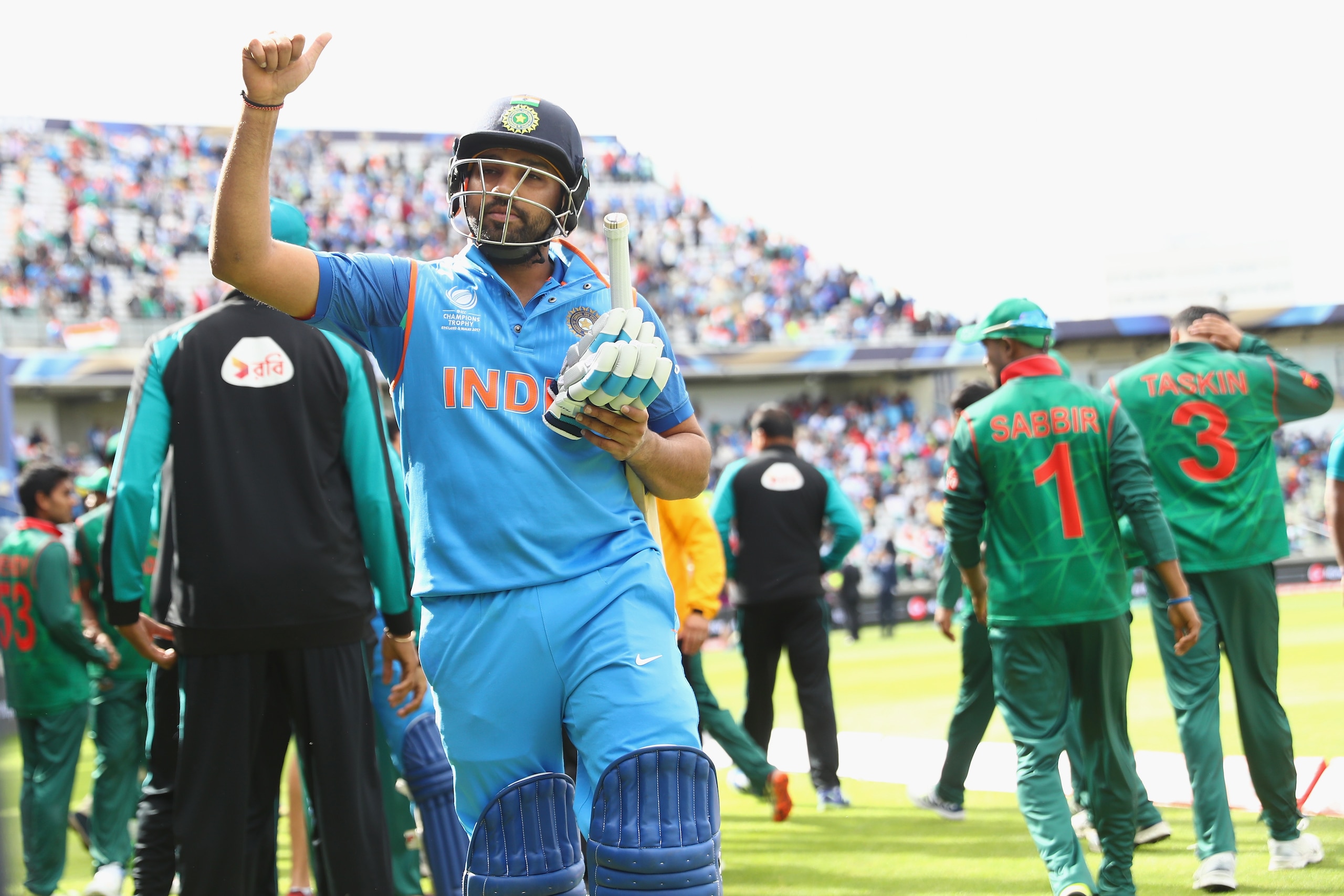 BIRMINGHAM, ENGLAND - JUNE 15: Rohit Sharma of India celebrates his match winning performance of 123 not out and his sides 9 wicket victory during the ICC Champions Trophy Semi-Final match between Bangladesh and India at Edgbaston on June 15, 2017 in Birm
