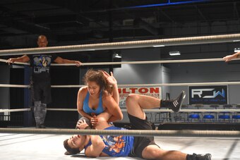 Hyan grounds Gino with an armbar during training.