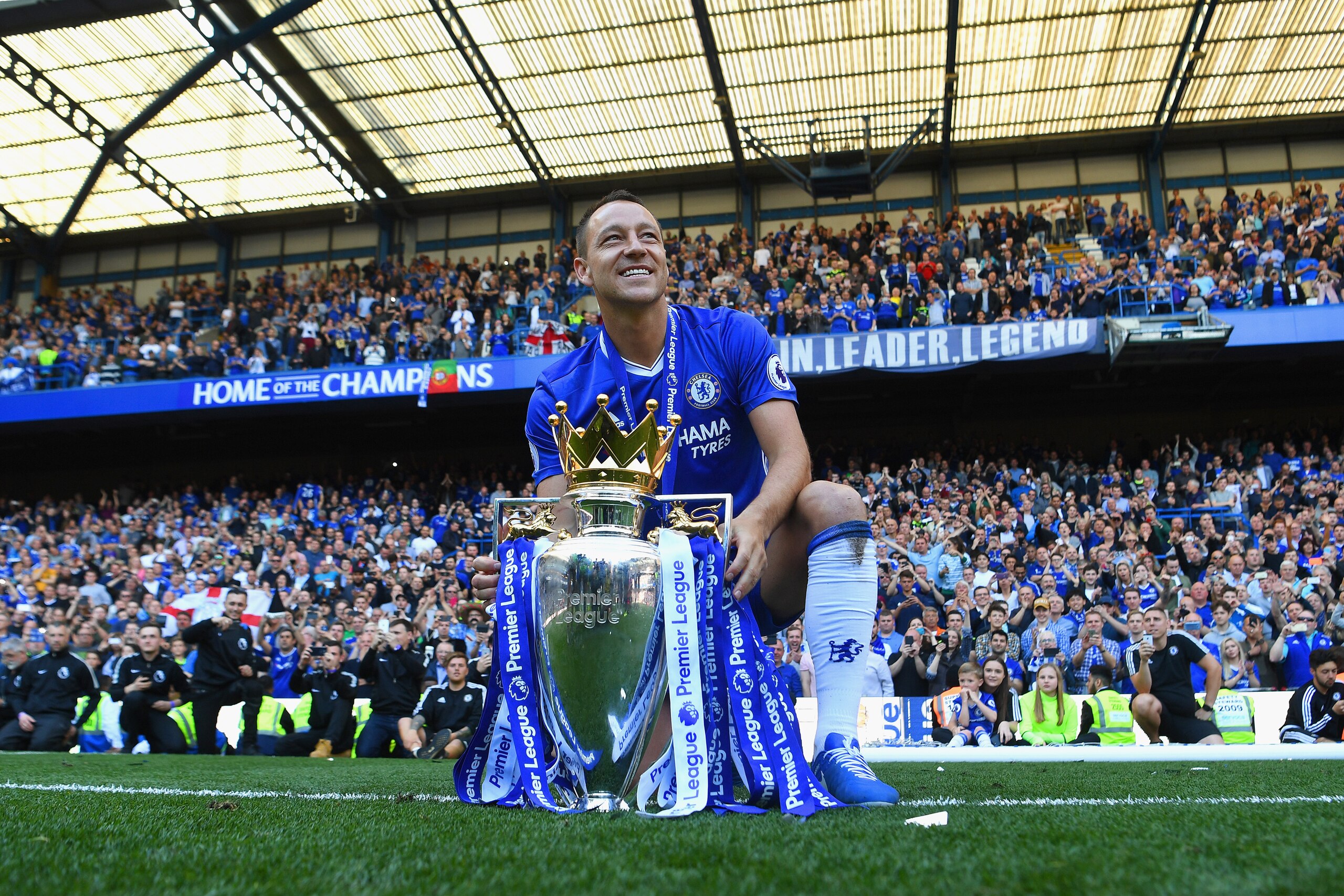 LONDON, ENGLAND - MAY 21:  John Terry of Chelsea poses with the Premier League Trophy after the Premier League match between Chelsea and Sunderland at Stamford Bridge on May 21, 2017 in London, England.  (Photo by Michael Regan/Getty Images)