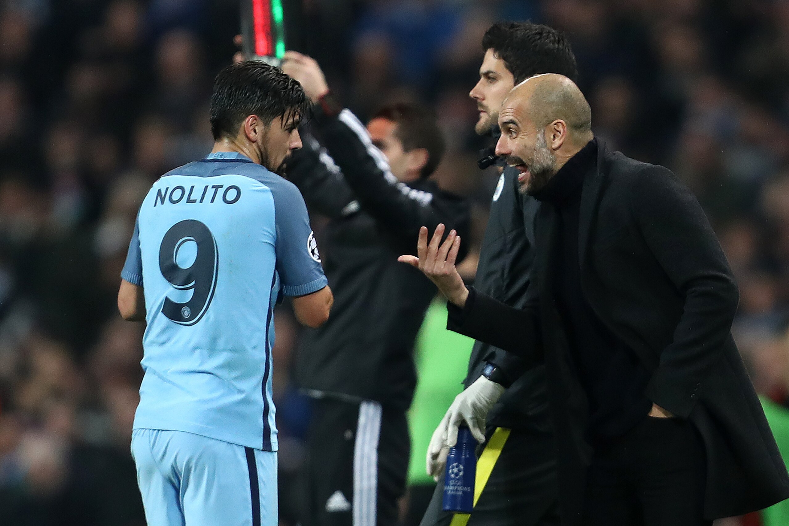 MANCHESTER, ENGLAND - DECEMBER 06:  Nolito of Manchester City is spoken to by his Head Coach /Manager Pep Guardiola during the UEFA Champions League match between Manchester City FC and Celtic FC at Etihad Stadium on December 6, 2016 in Manchester, Englan