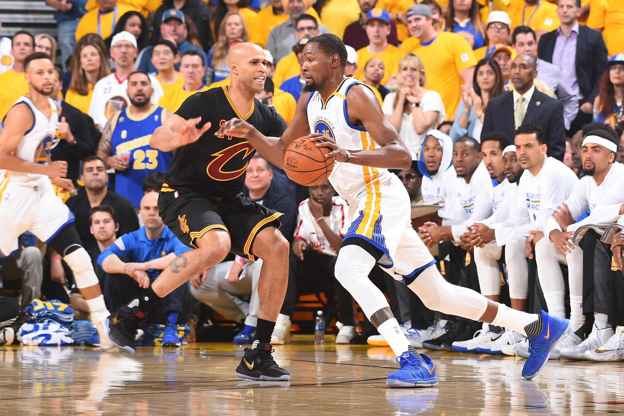 OAKLAND, CA - JUNE 12:  Kevin Durant #35 of the Golden State Warriors handles the ball against Richard Jefferson #24 of the Cleveland Cavaliers in Game Five of the 2017 NBA Finals on June 12, 2017 at ORACLE Arena in Oakland, California. NOTE TO USER: User