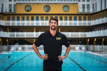 US swimming champion Michael Phelps poses during a photo session at the Molitor swimming pool on February 16, 2017 in Paris. / AFP / LIONEL BONAVENTURE        (Photo credit should read LIONEL BONAVENTURE/AFP/Getty Images)