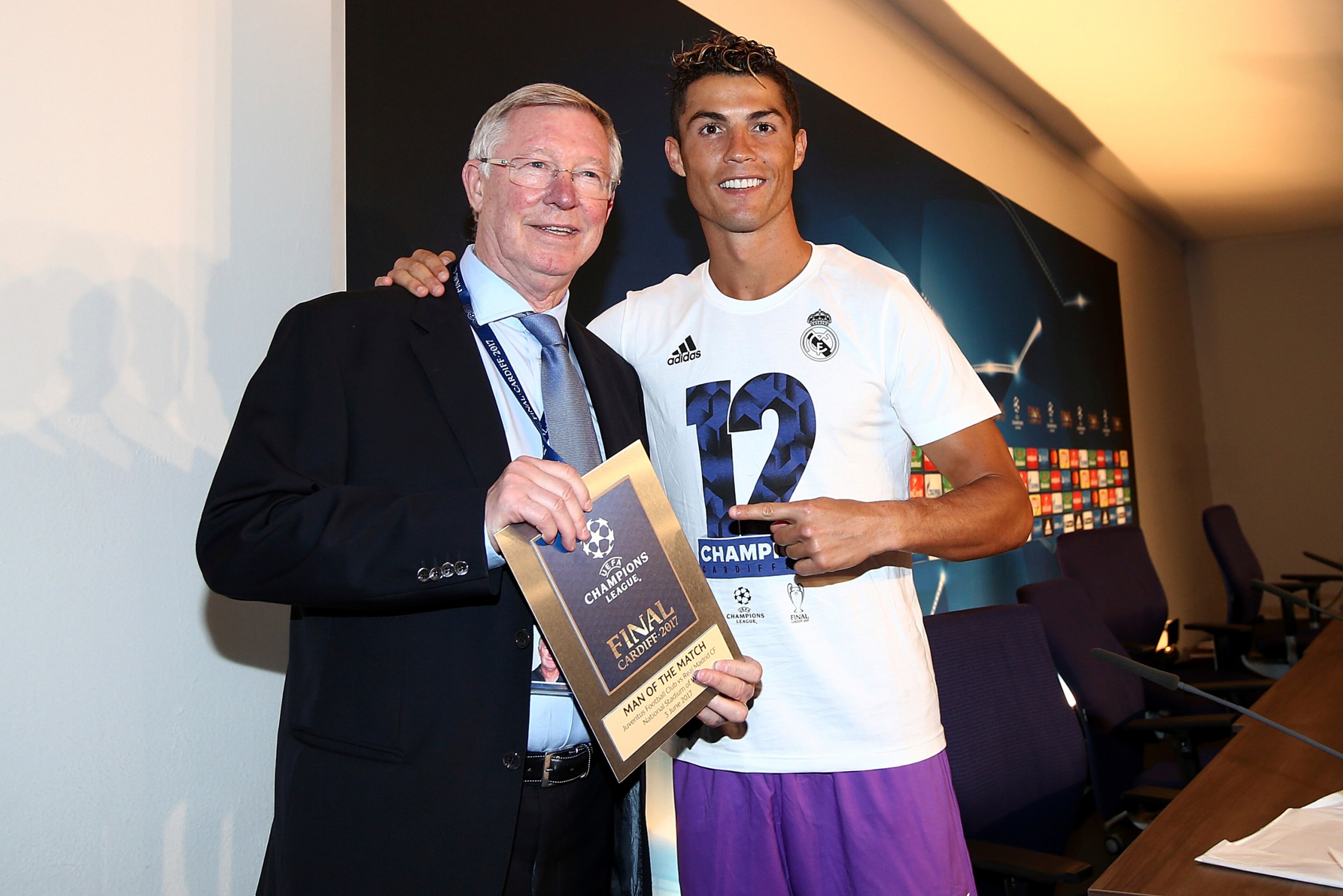CARDIFF, WALES - JUNE 03: In this handout image provided by UEFA, Cristiano Ronaldo of Real Madrid poses with the Man of the Match award and Sir Alex Ferguson after the UEFA Champions League Final between Juventus and Real Madrid at National Stadium of W CARDIFF, WALES - JUNE 03: In this handout image provided by UEFA, Cristiano Ronaldo of Real Madrid poses with the Man of the Match award and Sir Alex Ferguson after the UEFA Champions League Final between Juventus and Real Madrid at National Stadium of W