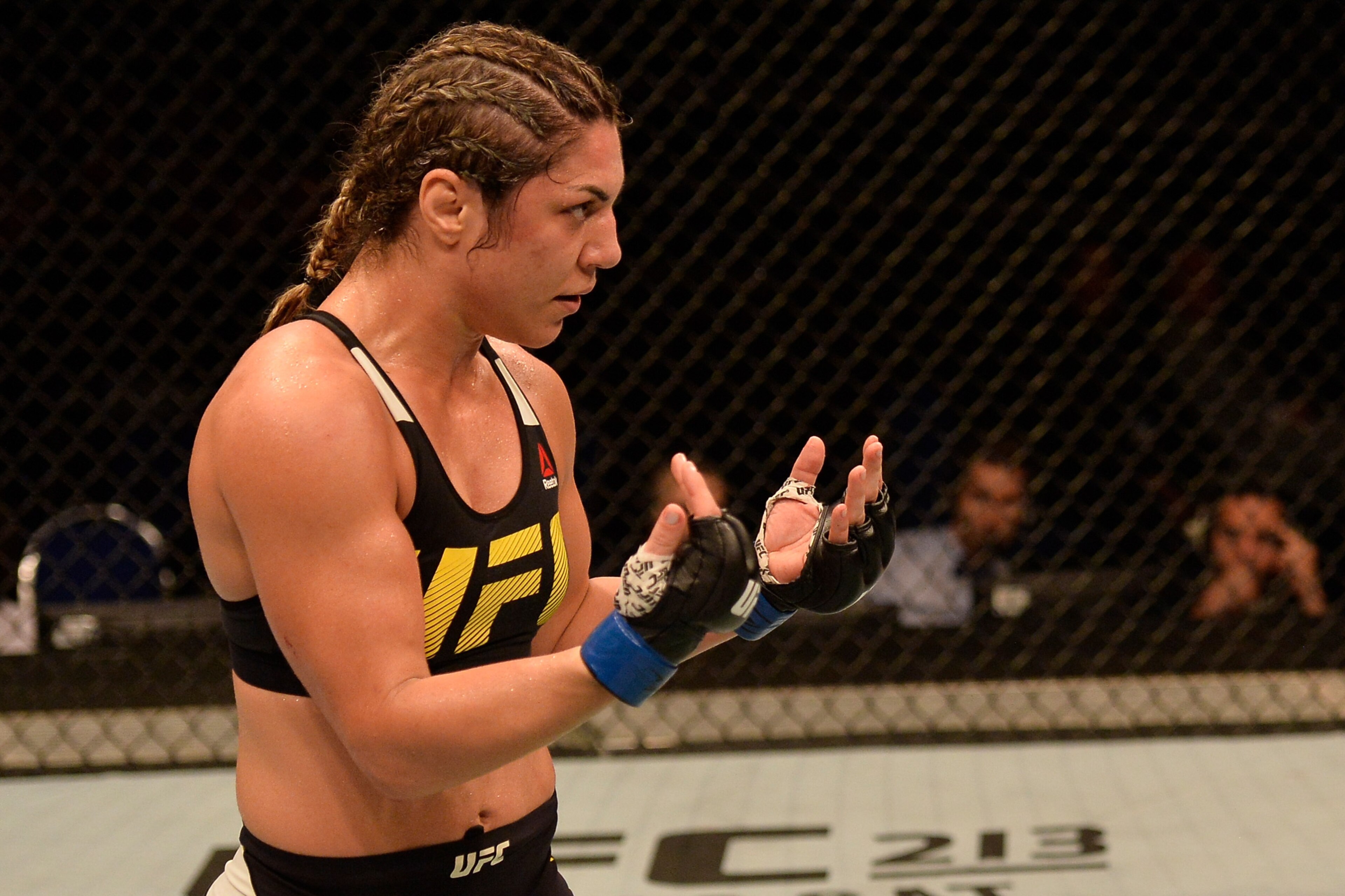 SINGAPORE - JUNE 17:   Bethe Correia of Brazil taunts Holly Holm (not pictured) in their women's bantamweight bout during the UFC Fight Night event at the Singapore Indoor Stadium on June 17, 2017 in Singapore. (Photo by Brandon Magnus/Zuffa LLC/Zuffa LLC