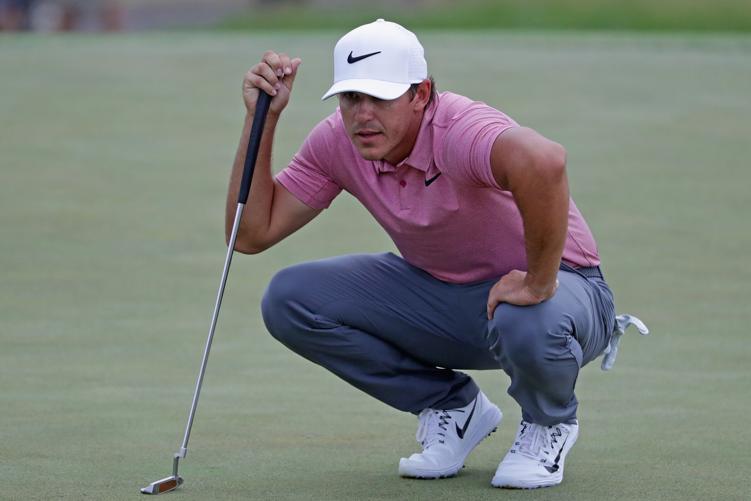 HARTFORD, WI - JUNE 17: Brooks Koepka of the United States lines up a putt on the 15th green during the third round of the 2017 U.S. Open at Erin Hills on June 17, 2017 in Hartford, Wisconsin. (Photo by Streeter Lecka/Getty Images) HARTFORD, WI - JUNE 17: Brooks Koepka of the United States lines up a putt on the 15th green during the third round of the 2017 U.S. Open at Erin Hills on June 17, 2017 in Hartford, Wisconsin. (Photo by Streeter Lecka/Getty Images)