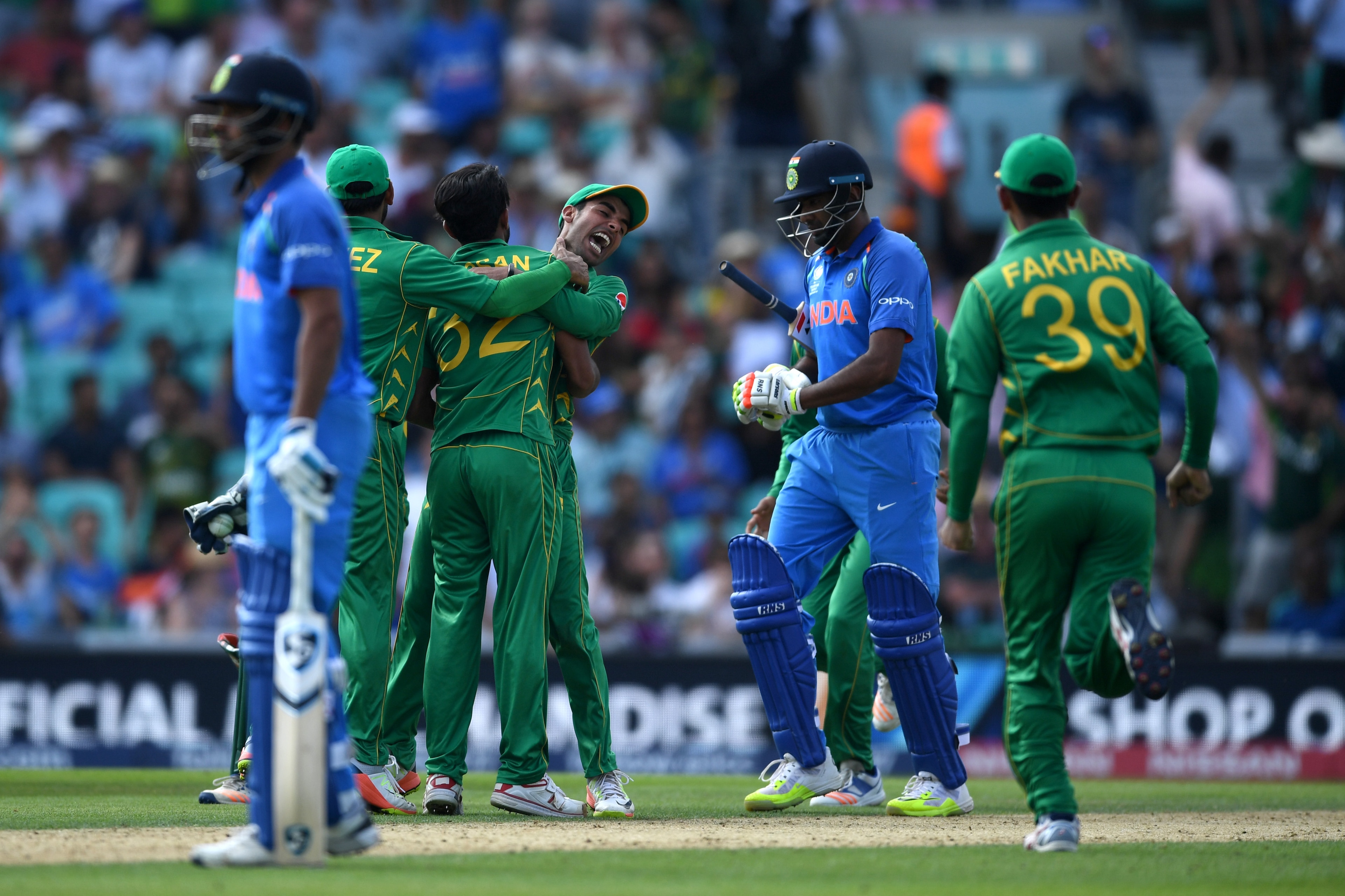 LONDON, ENGLAND - JUNE 18:  Pakistan celebrate after Hasan Ali dismisses Ravichandran Ashwin of India during the ICC Champions Trophy Final between India and Pakistan at The Kia Oval on June 18, 2017 in London, England.  (Photo by Gareth Copley/Getty Imag