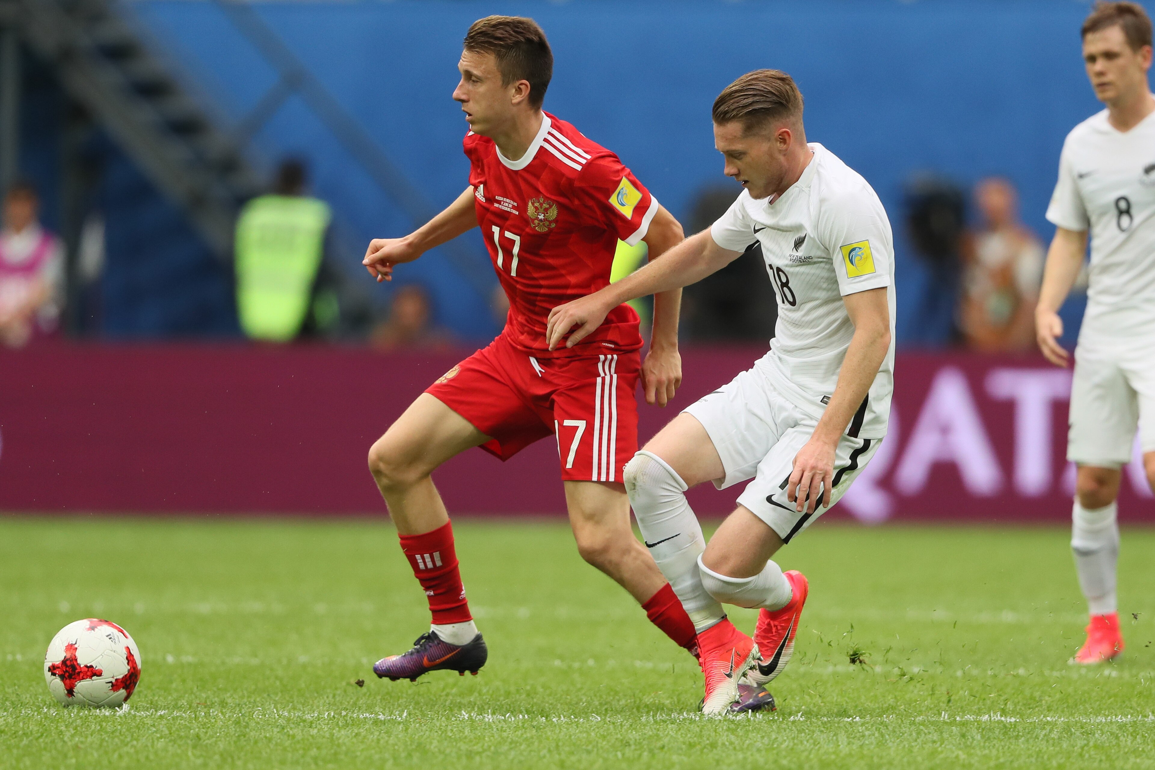 SAINT PETERSBURG, RUSSIA - JUNE 17: Aleksandr Golovin of Russia and Kip Covley of New Zealand during the Group A - FIFA Confederations Cup Russia 2017 match between Russia and New Zealand at Saint Petersburg Stadium on June 17, 2017 in Saint Petersburg, R