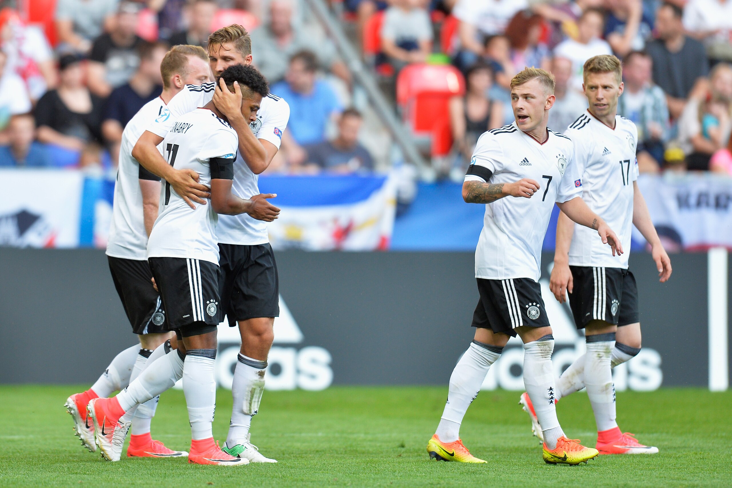 TYCHY, POLAND - JUNE 18: Serge Gnabry of Germany celebrates scoring his sides second goal with his Germany team mates during the UEFA European Under-21 Championship Group C match between Germany and Czech Republic at Tychy Stadium on June 18, 2017 in Tych