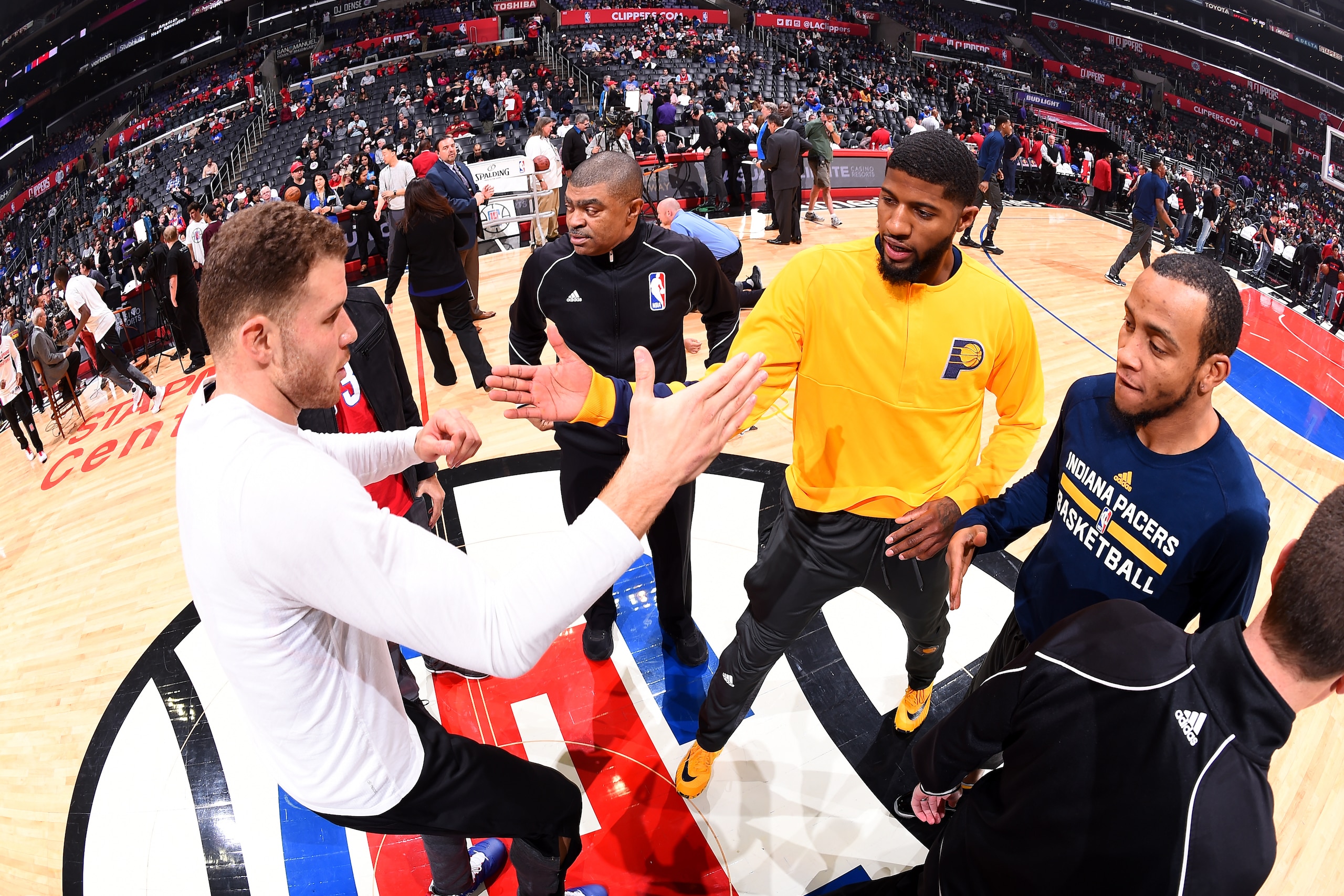 LOS ANGELES, CA - DECEMBER 04: Blake Griffin #32 of the LA Clippers and Paul George #13 of the Indiana Pacers greet before the game on December 04, 2016 at STAPLES Center in Los Angeles, California. NOTE TO USER: User expressly acknowledges and agrees tha