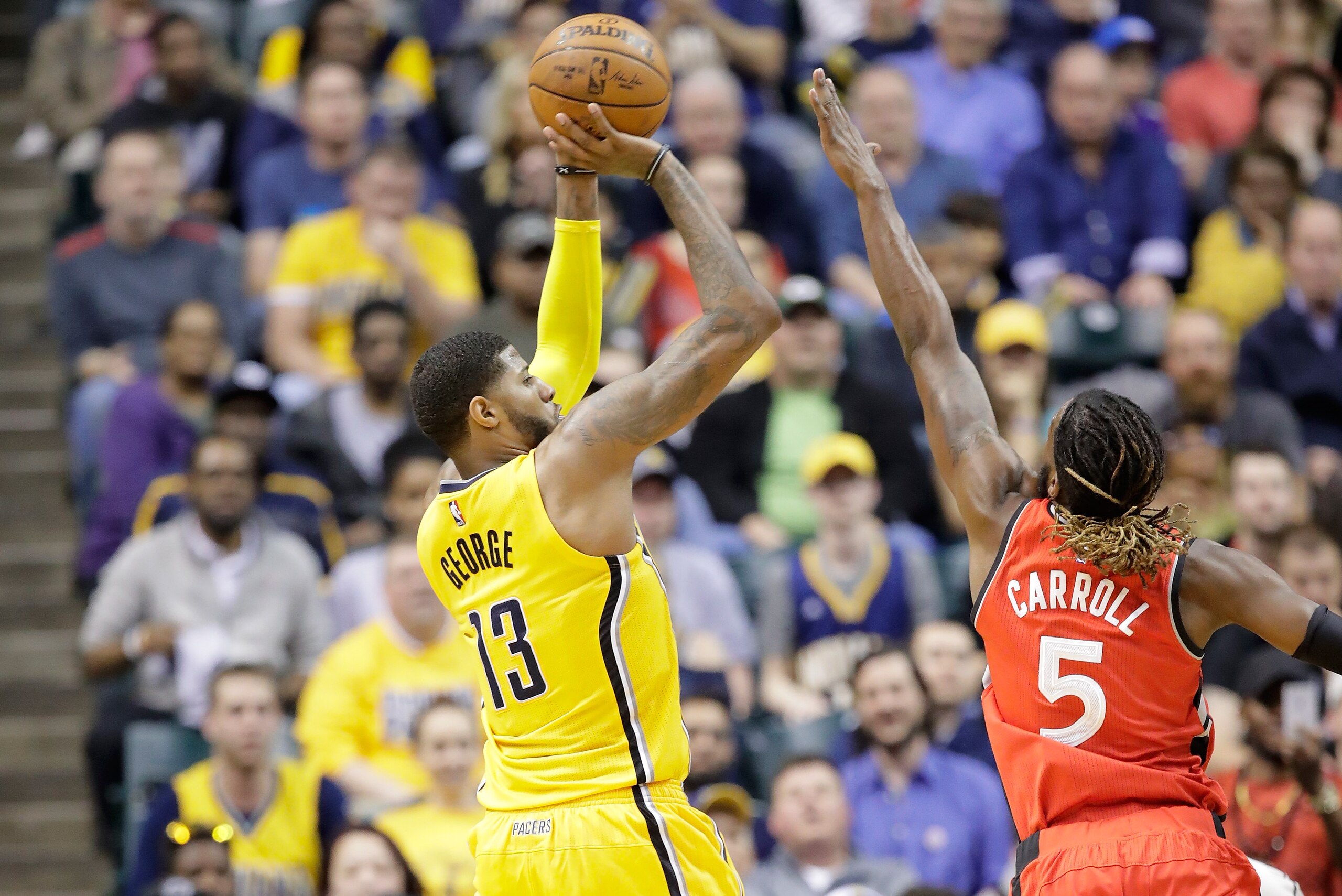 INDIANAPOLIS, IN - APRIL 04:  Paul George #13 of the  Indiana Pacers shoots the ball against the Toronto Raptors at Bankers Life Fieldhouse on April 4, 2017 in Indianapolis, Indiana.   NOTE TO USER: User expressly acknowledges and agrees that, by download