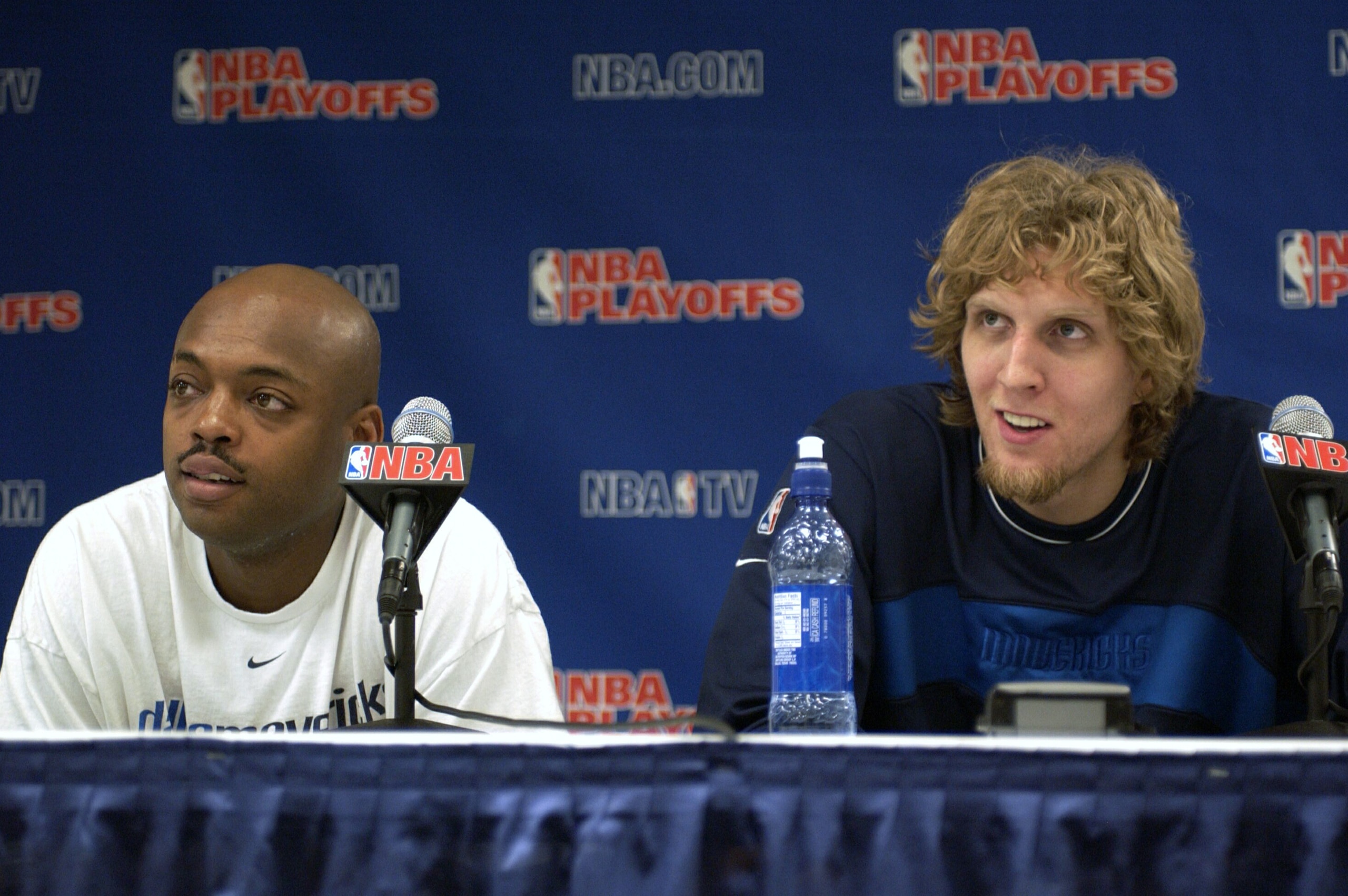 DALLAS - MAY 8:  (L-R) Nick Van Exel #31 and Dirk Nowitzki #41 of the Dallas Mavericks answers questions to the media at the post game press conference following the victory over the Sacramento Kings in Game two of the Western Conference Semifinals during