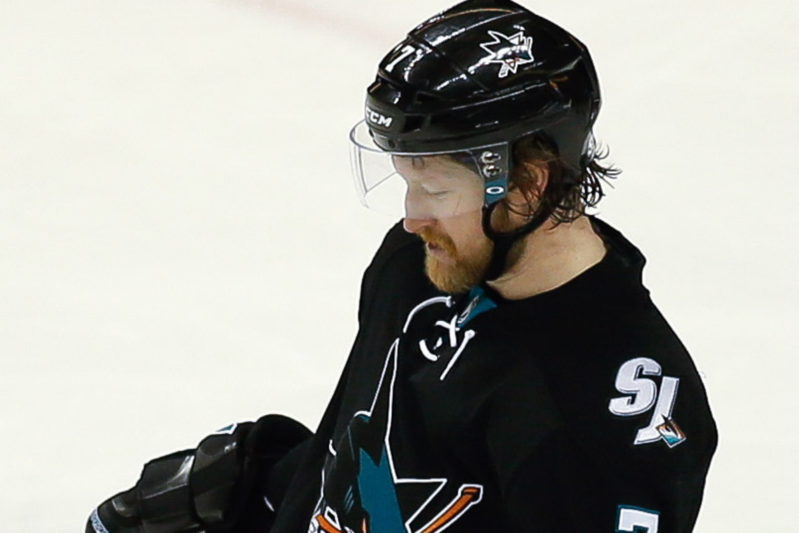 Apr 6, 2017; San Jose, CA, USA; San Jose Sharks defenseman Paul Martin (7) reacts after the Edmonton Oilers scored a goal during the third period at SAP Center at San Jose. The Edmonton Oilers defeated the San Jose Sharks 4-2.  Mandatory Credit: Stan Szet
