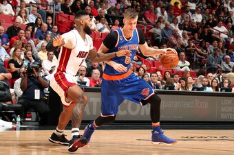 MIAMI, FL - MARCH 31: Kristaps Porzingis #6 of the New York Knicks handles the ball during the game against the Miami Heat on March 31, 2017 at AmericanAirlines Arena in Miami, Florida. NOTE TO USER: User expressly acknowledges and agrees that, by downloa