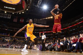 LOS ANGELES, CA - MARCH 10: LeBron James #23 of the Cleveland Cavaliers shoots the ball during the game against Julius Randle #30 of the Los Angeles Lakers on March 10, 2016 at STAPLES Center in Los Angeles, California. NOTE TO USER: User expressly acknow