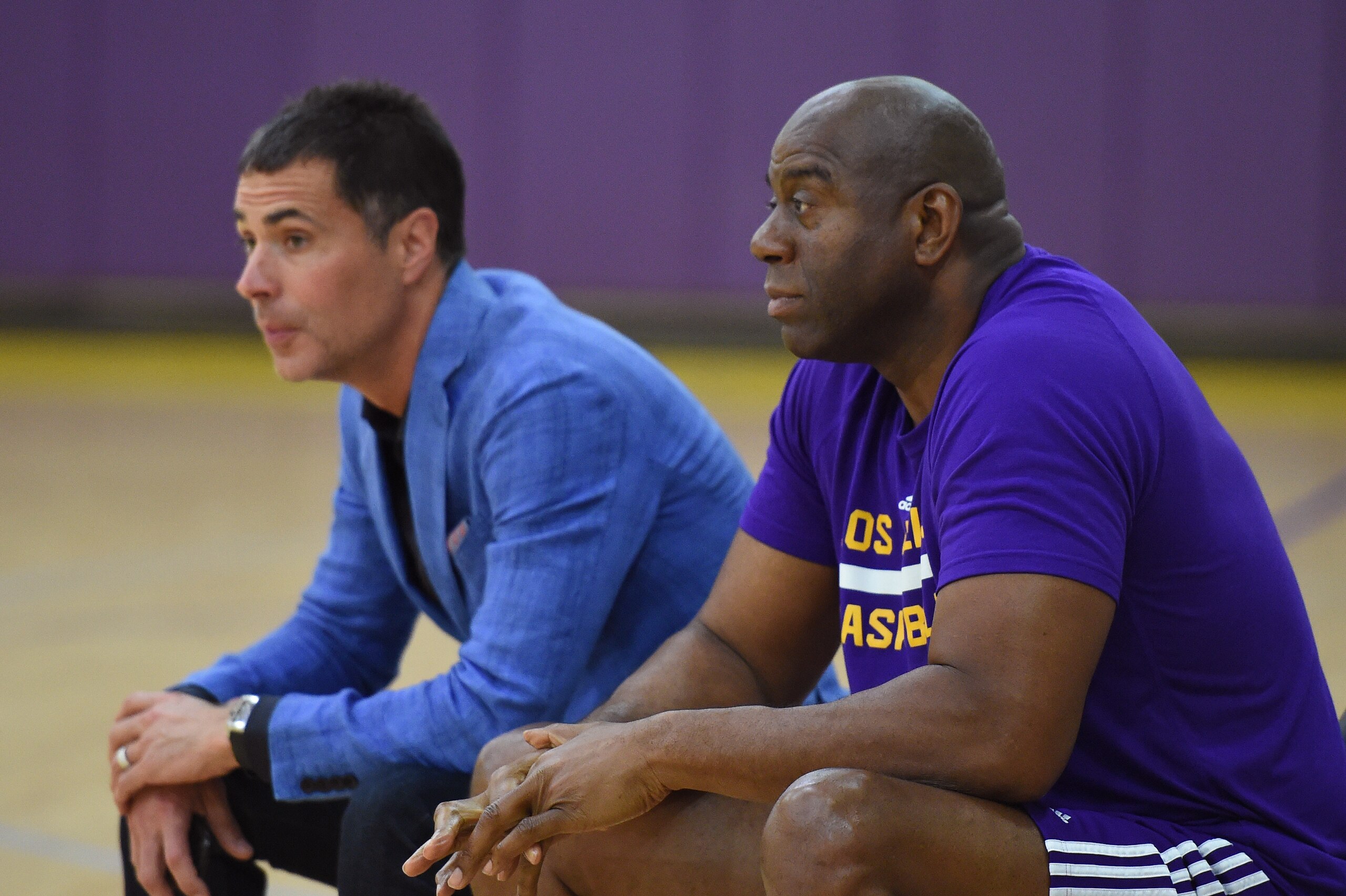 EL SEGUNDO, CA - JUNE 15:  Magic Johnson, president of basketball operations for the Los Angeles Lakers, and Rob Pelinka, General Manager of the Los Angeles Lakers, look on during the Markelle Fultz workout at Toyota Sports Center on June 15, 2017 in El S