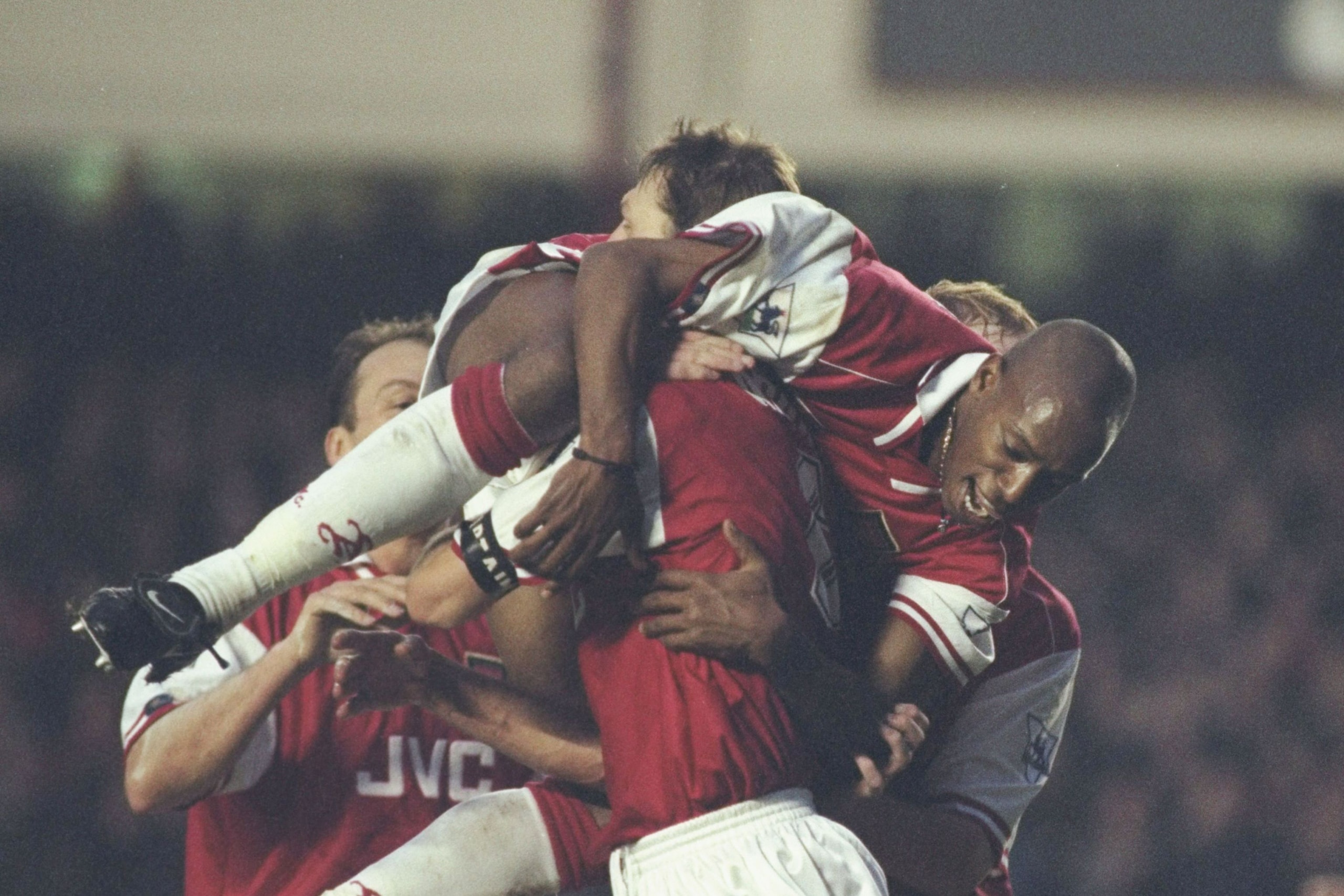 7 Dec 1996:  Ian Wright climbs over the back of Arsenal captain Tony Adams to celebrate his teams goal against Derby County. During the FA Carling Premier league match at Highbury in London. \ Mandatory Credit: Allsport UK /Allsport