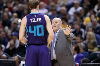 INDIANAPOLIS, IN - NOVEMBER 19:  Steve Clifford the head of the Charlotte Hornets gives instructions to Cody Zeller #40 during the game against Indiana Pacers at Bankers Life Fieldhouse on November 19, 2014 in Indianapolis, Indiana. NOTE TO USER: User exp
