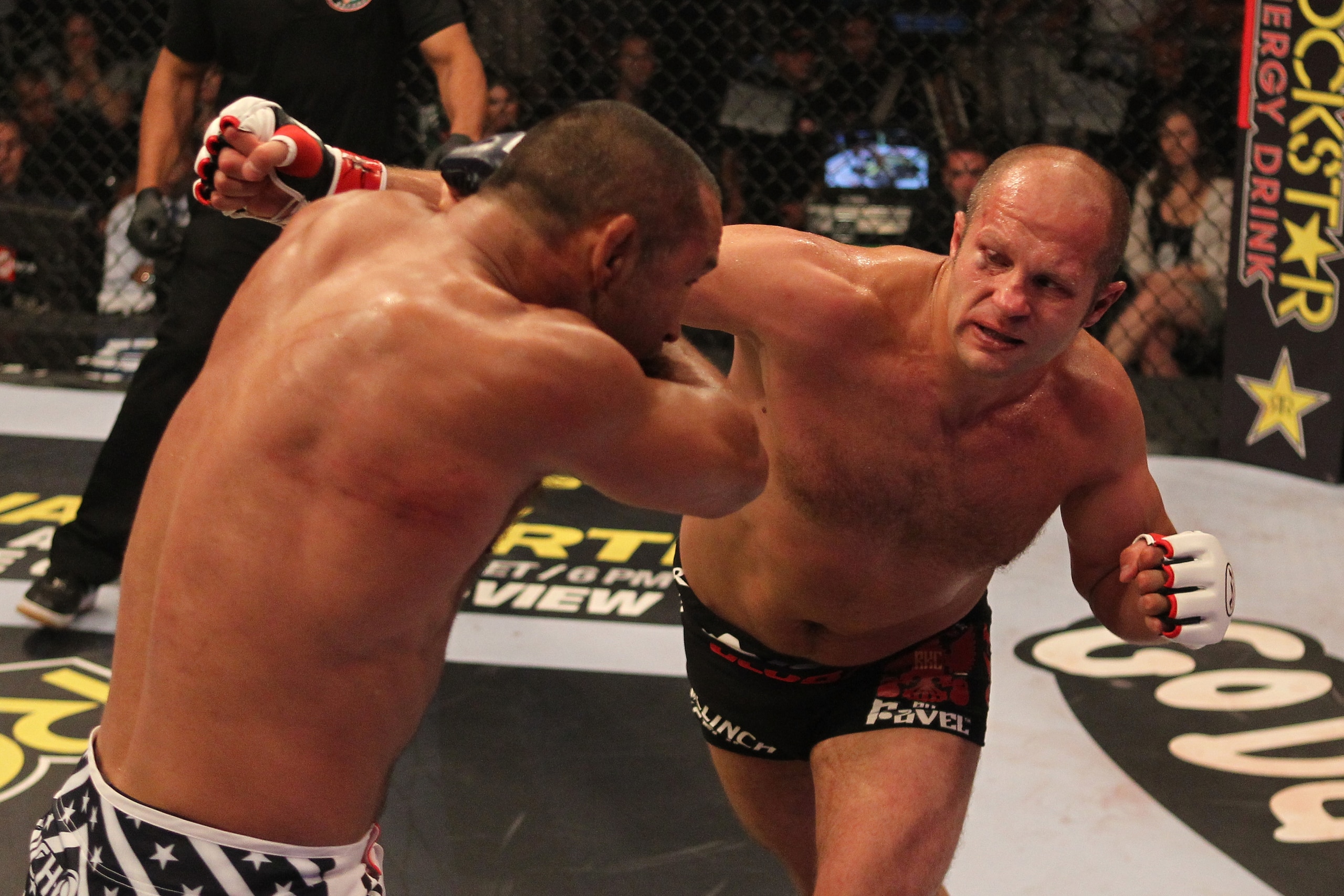 HOFFMAN ESTATES, IL - JULY 30:  (R-L) Fedor Emelianenko punches Dan Henderson during a heavyweight fight at the Strikeforce event at Sears Centre Arena on July 30, 2011 in Hoffman Estates, Illinois.  (Photo by Josh Hedges/Forza LLC/Forza LLC via Getty Ima