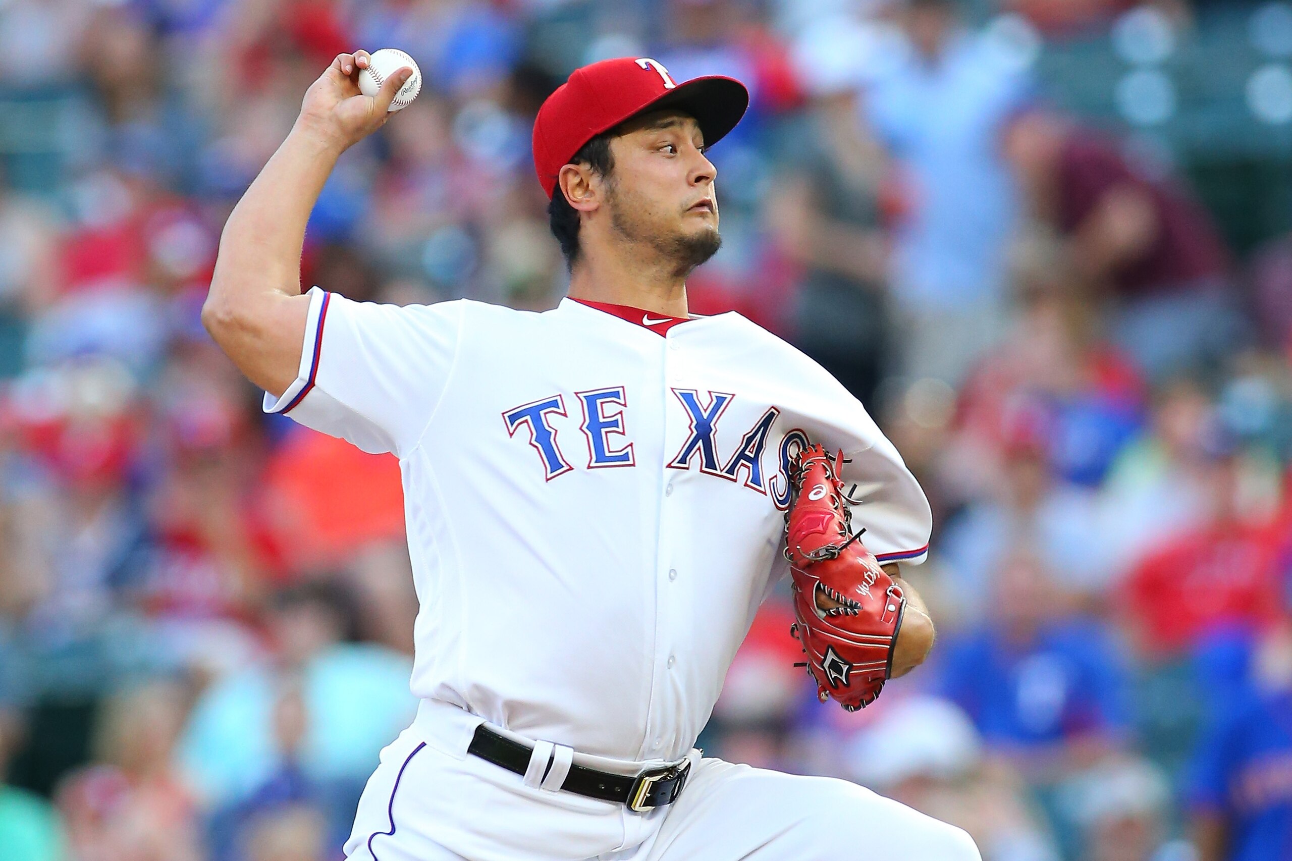 ARLINGTON, TX - JUNE 07: Yu Darvish #11 of the Texas Rangers throws in the second inning against the New York Mets at Globe Life Park in Arlington on June 7, 2017 in Arlington, Texas. (Photo by Rick Yeatts/Getty Images)