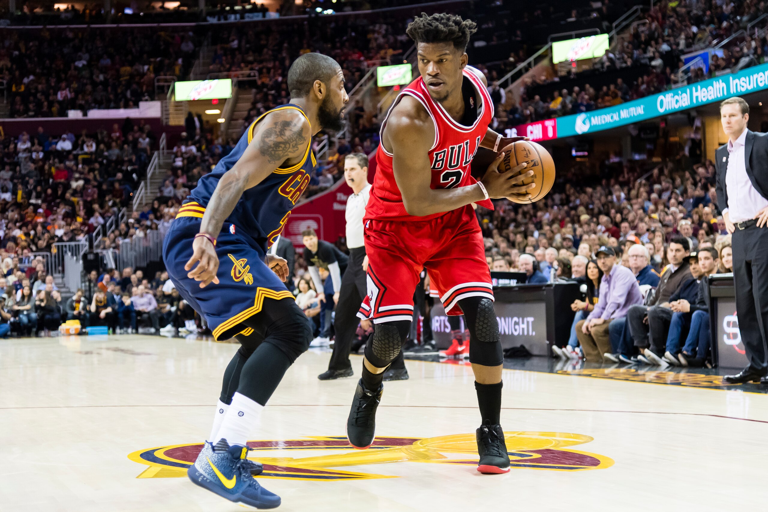 CLEVELAND, OH - FEBRUARY 25: Kyrie Irving #2 of the Cleveland Cavaliers puts pressure on Jimmy Butler #21 of the Chicago Bulls during the second half at Quicken Loans Arena on February 25, 2017 in Cleveland, Ohio. The Bulls defeated the Cavaliers 117-99. 