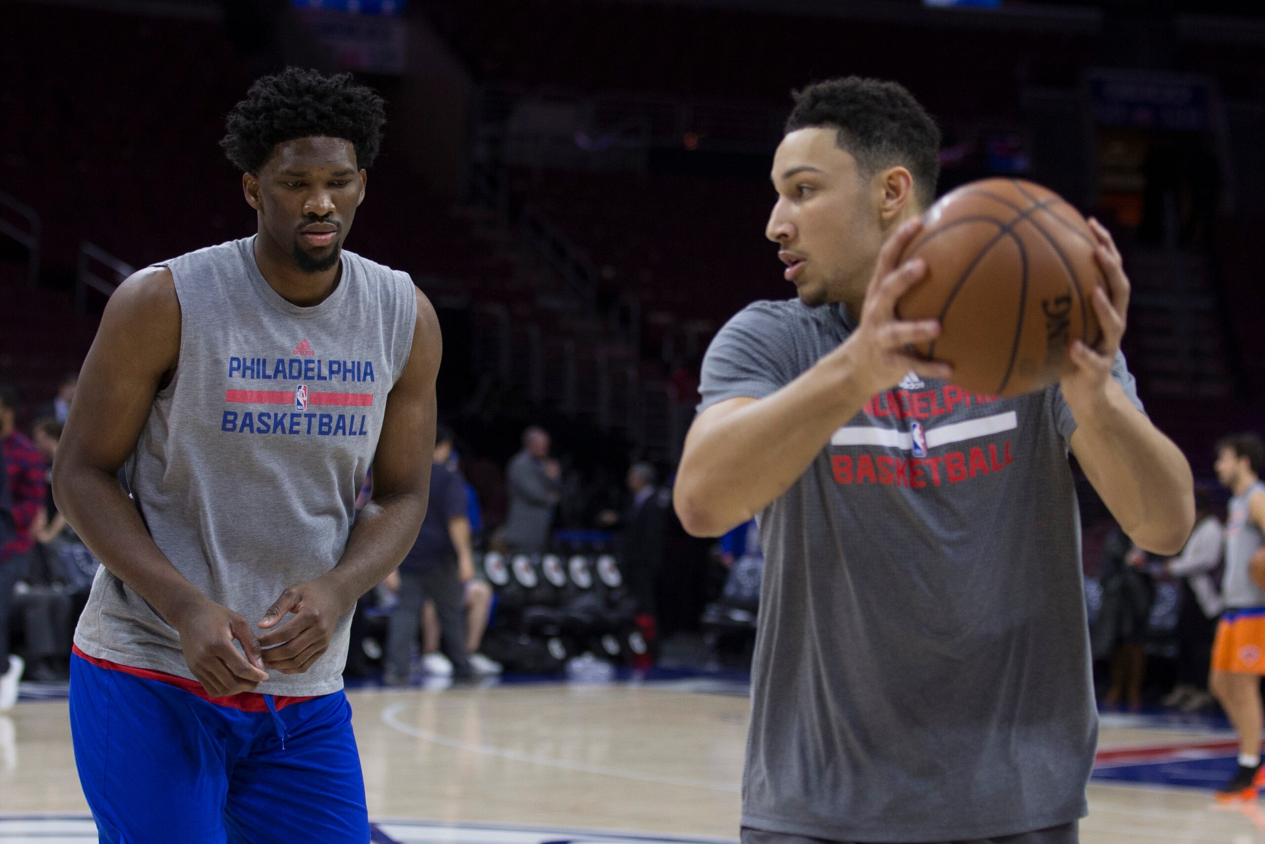 PHILADELPHIA, PA - JANUARY 11: Ben Simmons #25 of the Philadelphia 76ers warms up with Joel Embiid #21 prior to the game against the New York Knicks at the Wells Fargo Center on January 11, 2017 in Philadelphia, Pennsylvania. NOTE TO USER: User expressly 