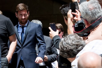BARCELONA, SPAIN - JUNE 02: Lionel Messi of FC Barcelona leaves the courthouse on June 2, 2016 in Barcelona, Spain. Lionel Messi and his father Jorge Messi, who manages his financial affairs, are accused of defrauding the Spanish Tax Agency of 4.1 million