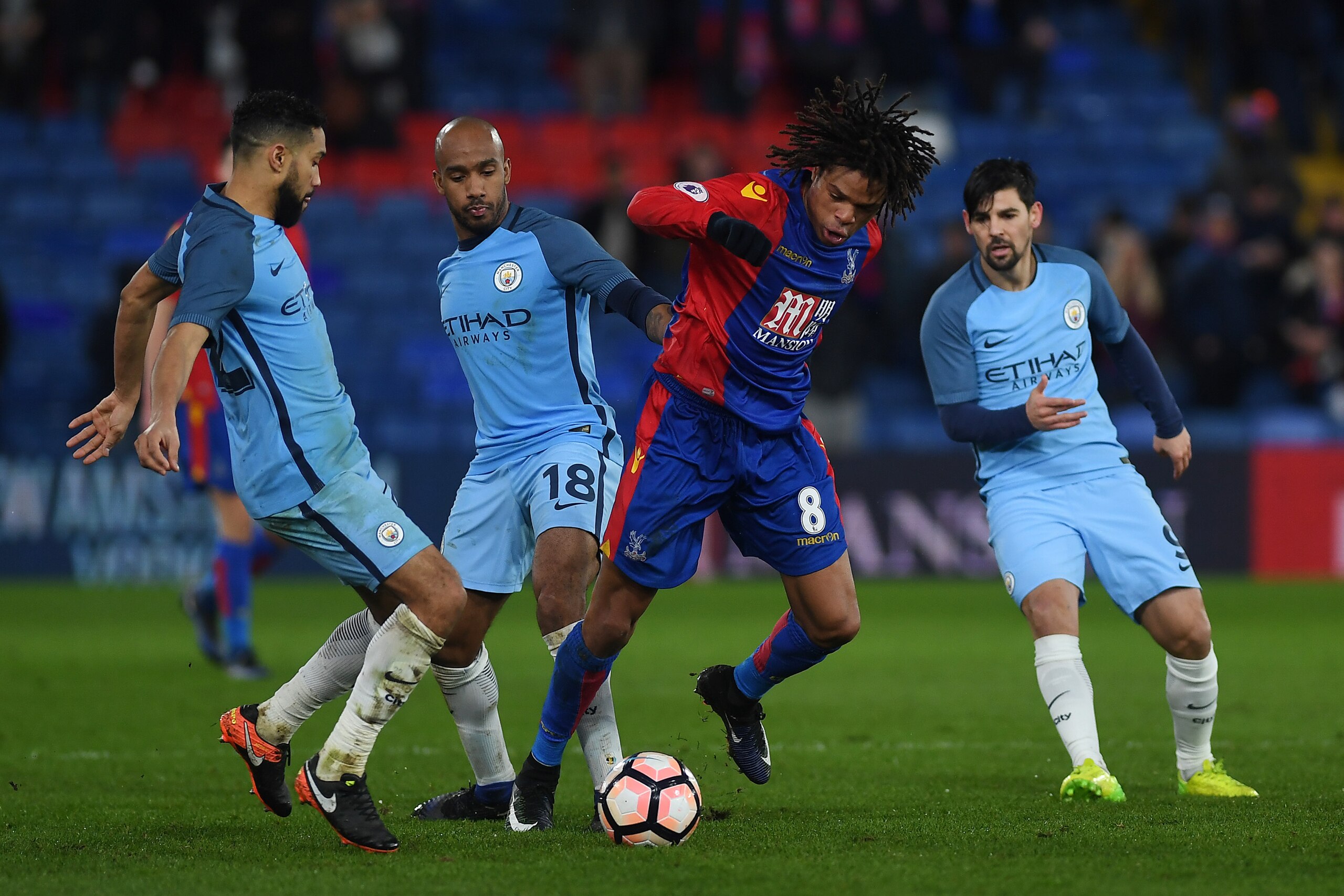 LONDON, ENGLAND - JANUARY 28:  Loic Remy of Crystal Palace is surrounded by Gael Clichy, Fabian Delph and Nolito of Manchester City during the The Emirates FA Cup Fourth Round match between Crystal Palace and Manchester City at Selhurst Park on January 28