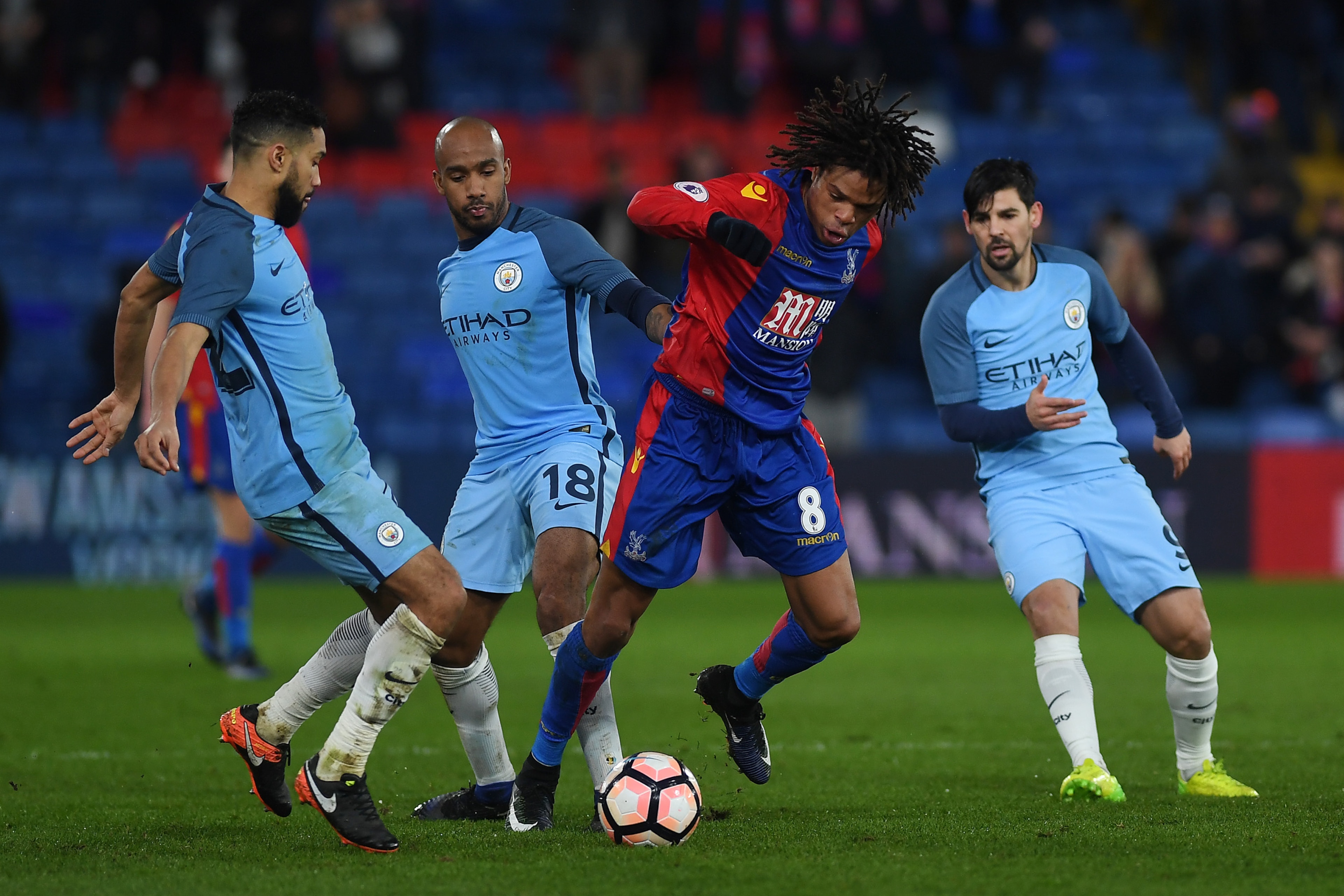 LONDON, ENGLAND - JANUARY 28:  Loic Remy of Crystal Palace is surrounded by Gael Clichy, Fabian Delph and Nolito of Manchester City during the The Emirates FA Cup Fourth Round match between Crystal Palace and Manchester City at Selhurst Park on January 28
