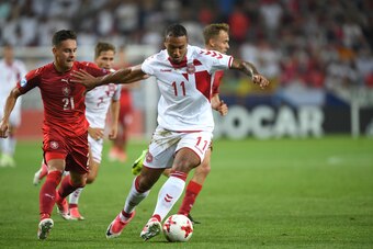 Czech Republic's defender Daniel Holzer (L) and Denmark's forward Kenneth Zohore vie for the ball during the UEFA U-21 European Championship Group C football match Czech Republic v Denmark in Tychy, Poland on June 24, 2017. / AFP PHOTO / PIOTR NOWAK      