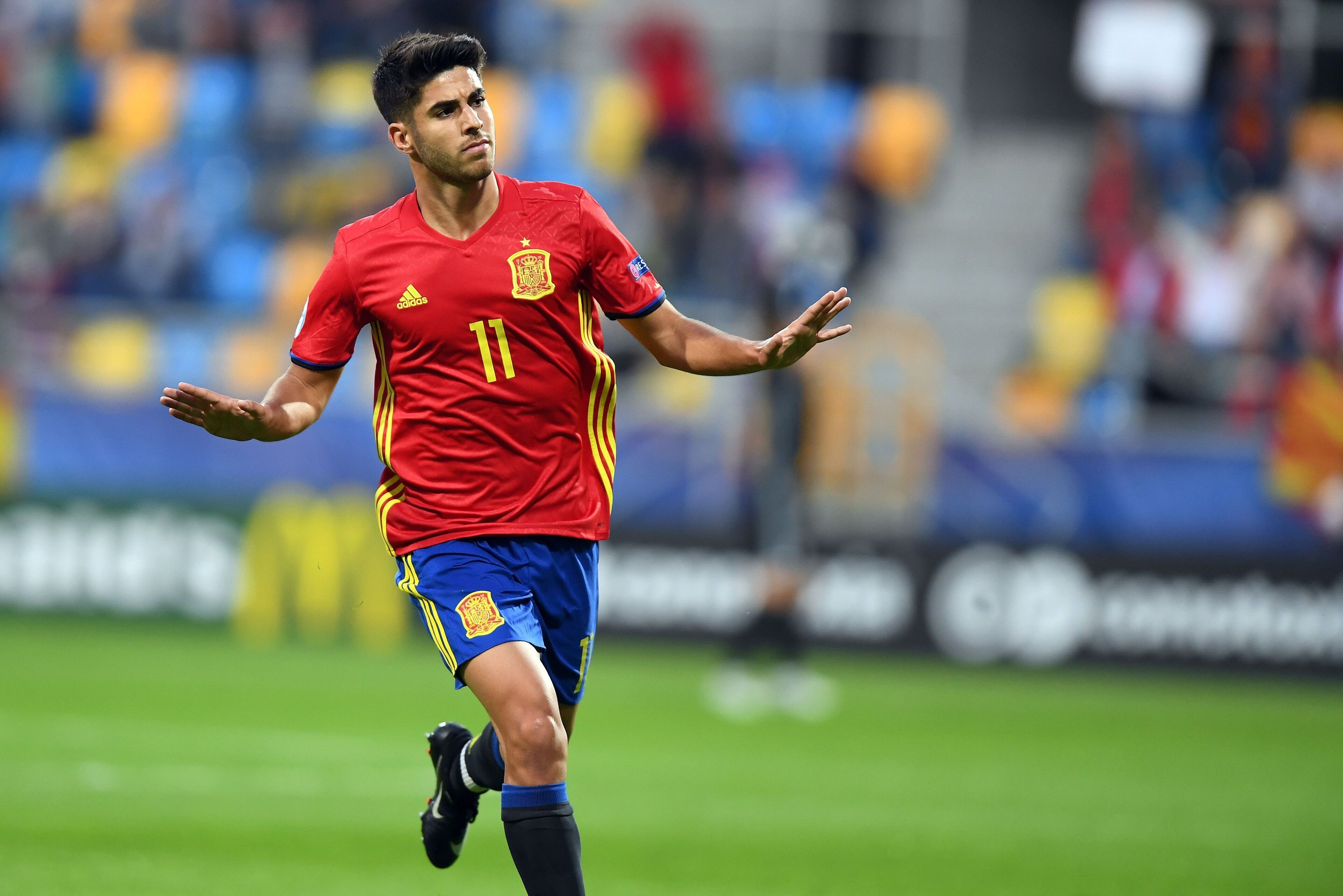 Spain's midfielder Marco Asensio celebrate scoring during the UEFA U-21 European Championship Group B football match Spain v FYR Macedonia on June 17, 2017 in Gdynia, Poland. / AFP PHOTO / Maciej GILLERT        (Photo credit should read MACIEJ GILLERT/AFP