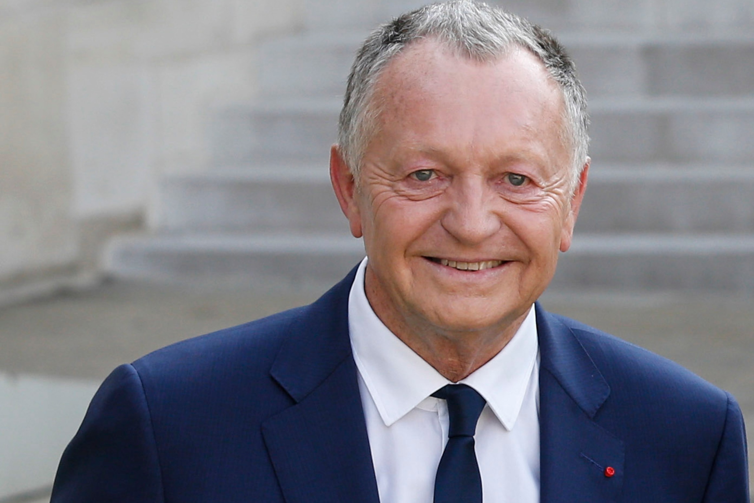 Lyon football club president Jean-Michel Aulas poses before a ceremony at the Elysee Palace in Paris on June 20, 2017, to celebrate the victory of Lyon's football team during the UEFA Women's Champions League. / AFP PHOTO / GEOFFROY VAN DER HASSELT       