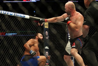Jun 25, 2017; Oklahoma City, OK, USA; Tim Boetsch (red gloves) fights Johny Hendricks (blue gloves) during UFC Fight Night at Chesapeake Energy Arena. Mandatory Credit: Sean Pokorny-USA TODAY Sports