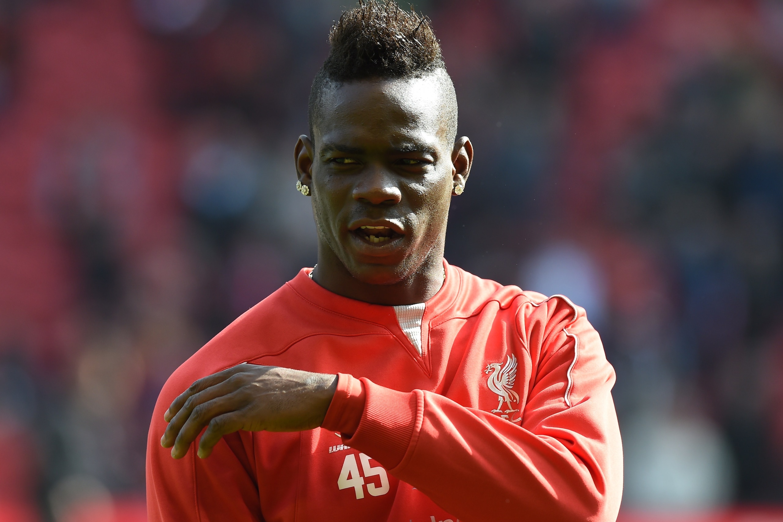 Liverpool's Italian striker Mario Balotelli warms up ahead of the English Premier League football match between Liverpool and Manchester United at Anfield in Liverpool, north west England on March 22, 2015. AFP PHOTO / PAUL ELLIS
RESTRICTED TO EDITORIAL Liverpool's Italian striker Mario Balotelli warms up ahead of the English Premier League football match between Liverpool and Manchester United at Anfield in Liverpool, north west England on March 22, 2015. AFP PHOTO / PAUL ELLIS
RESTRICTED TO EDITORIAL