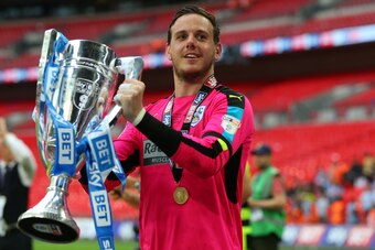 LONDON, ENGLAND - MAY 29: Danny Ward of Huddersfield Town celebrates with the trophy after the Sky Bet Championship Play Off Final match between Reading and Huddersfield Town at Wembley Stadium on May 29, 2017 in London, England. (Photo by Catherine Ivill