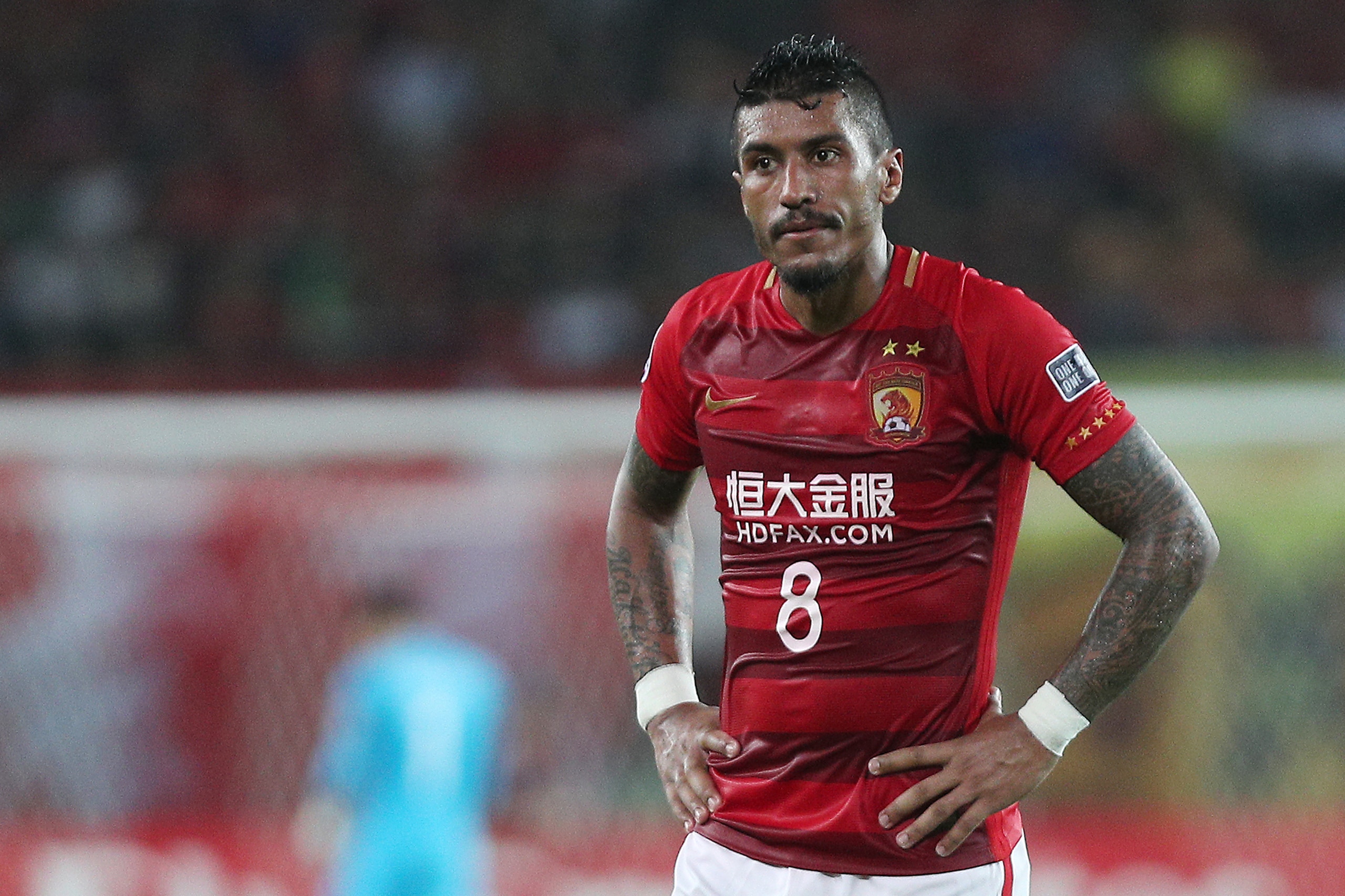 GUANGZHOU, CHINA - MAY 23: Paulinho  of Guangzhou Evergrande looks on during the AFC Champions League match between Guangzhou Evergrande and Kashima Antlers at Tianhe Sports Center on May 23, 2017 in Guangzhou, China. (Photo by Zhong Zhi/Getty Images)