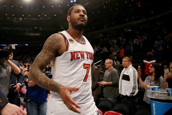 NEW YORK, NY - APRIL 12:  Carmelo Anthony #7 of the New York Knicks walks off the court after the 114-113 win over the Philadelphia 76ers at Madison Square Garden on April 12, 2017 in New York City. NOTE TO USER: User expressly acknowledges and agrees tha