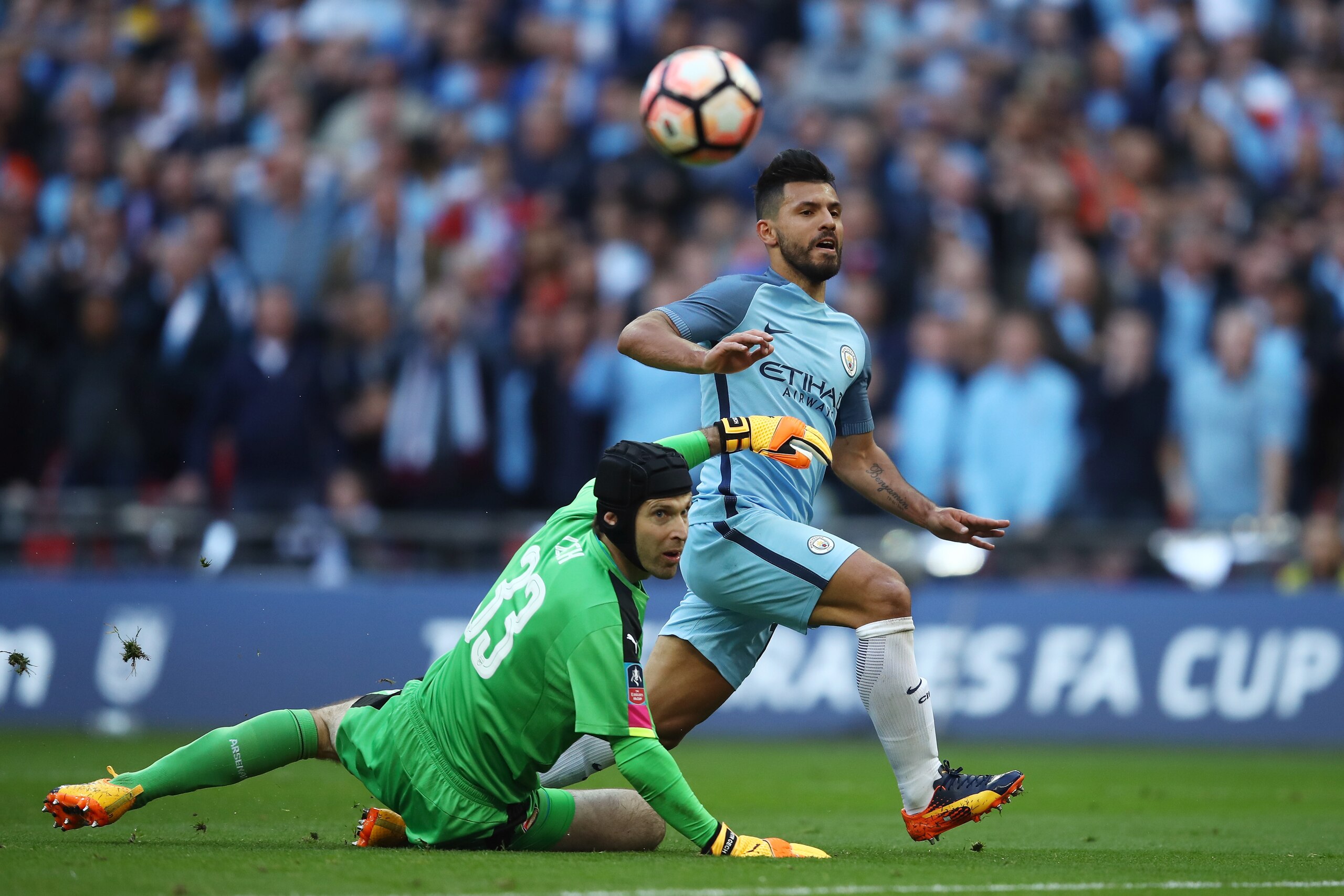 LONDON, ENGLAND - APRIL 23:  Sergio Aguero of Manchester City scores the opening goal past Petr Cech of Arsenal during the Emirates FA Cup Semi-Final match between Arsenal and Manchester City at Wembley Stadium on April 23, 2017 in London, England.  (Phot
