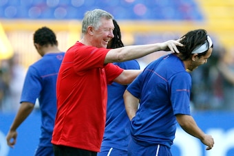 Sir Alex and Carlos Tevez in happier times.