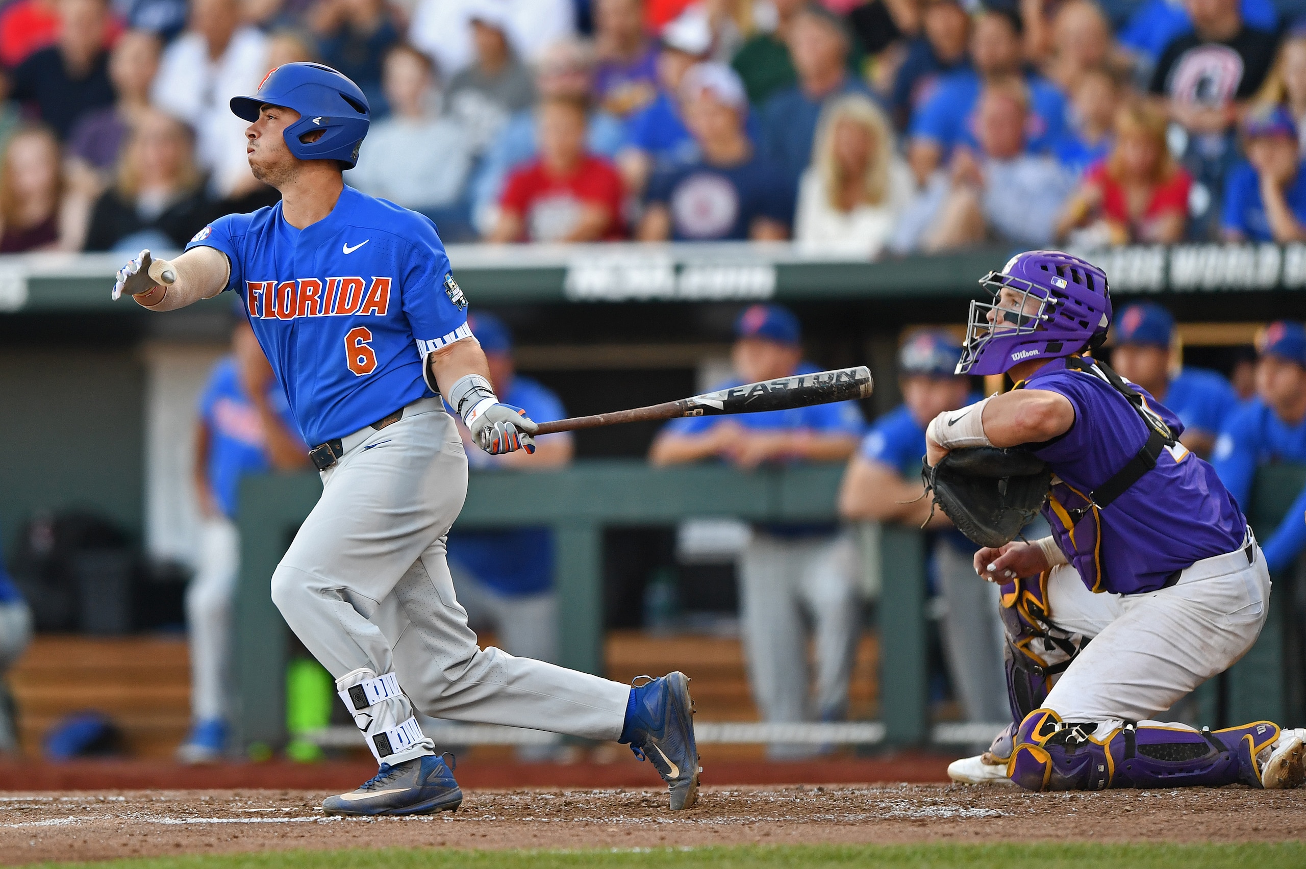 OMAHA, NE - JUNE 26:  Third basemen Jonathan India #6 of the Florida Gators hits a two run double against the LSU Tigers in the third inning during game one of the College World Series Championship Series on June 26, 2017 at TD Ameritrade Park in Omaha, N