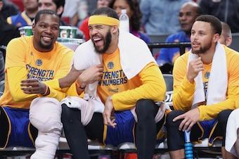 Apr 24, 2017; Portland, OR, USA; Golden State Warriors forward Kevin Durant (35) and center JaVale McGee (1) and guard Stephen Curry (30) react in the closing the seconds of a 128-103 win over the Portland Trail Blazers to clinch game four of the first ro