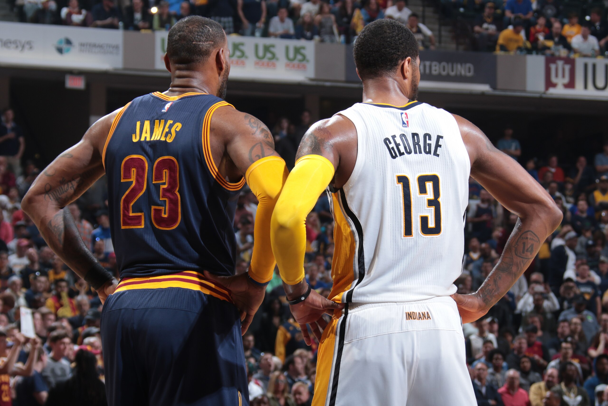 INDIANAPOLIS, IN - APRIL 23:  LeBron James #23 of the Cleveland Cavaliers and Paul George #13 of the Indiana Pacers look on during Game Four of the Eastern Conference Quarterfinals of the 2017 NBA Playoffs on April 23, 2017 at Bankers Life Fieldhouse in I