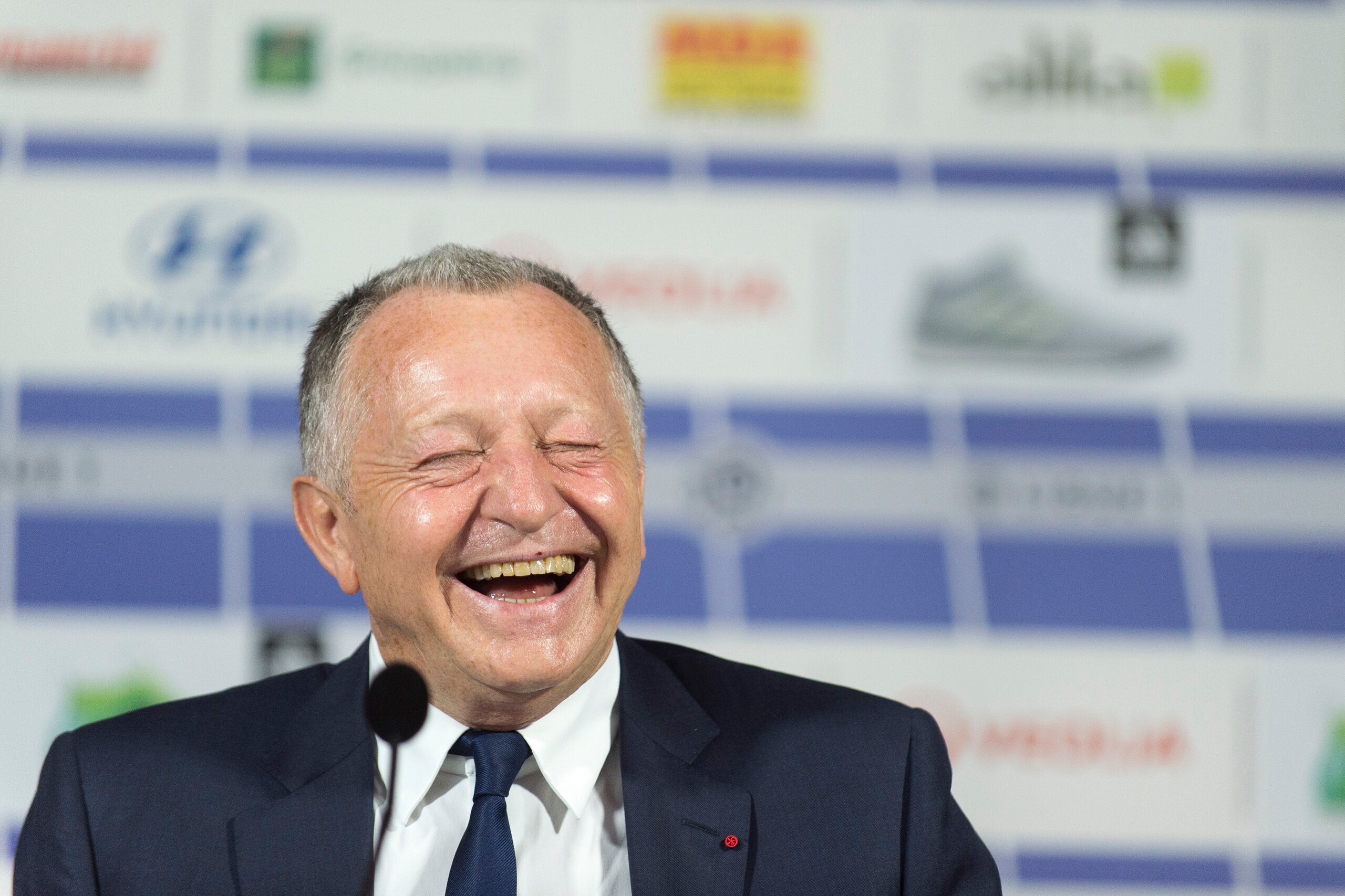 Lyon's French president Jean-Michel Aulas laughs during a press conference on June 16, 2017 at the Parc Olympique Lyonnais in Lyon, eastern France. / AFP PHOTO / ROMAIN LAFABREGUE        (Photo credit should read ROMAIN LAFABREGUE/AFP/Getty Images)