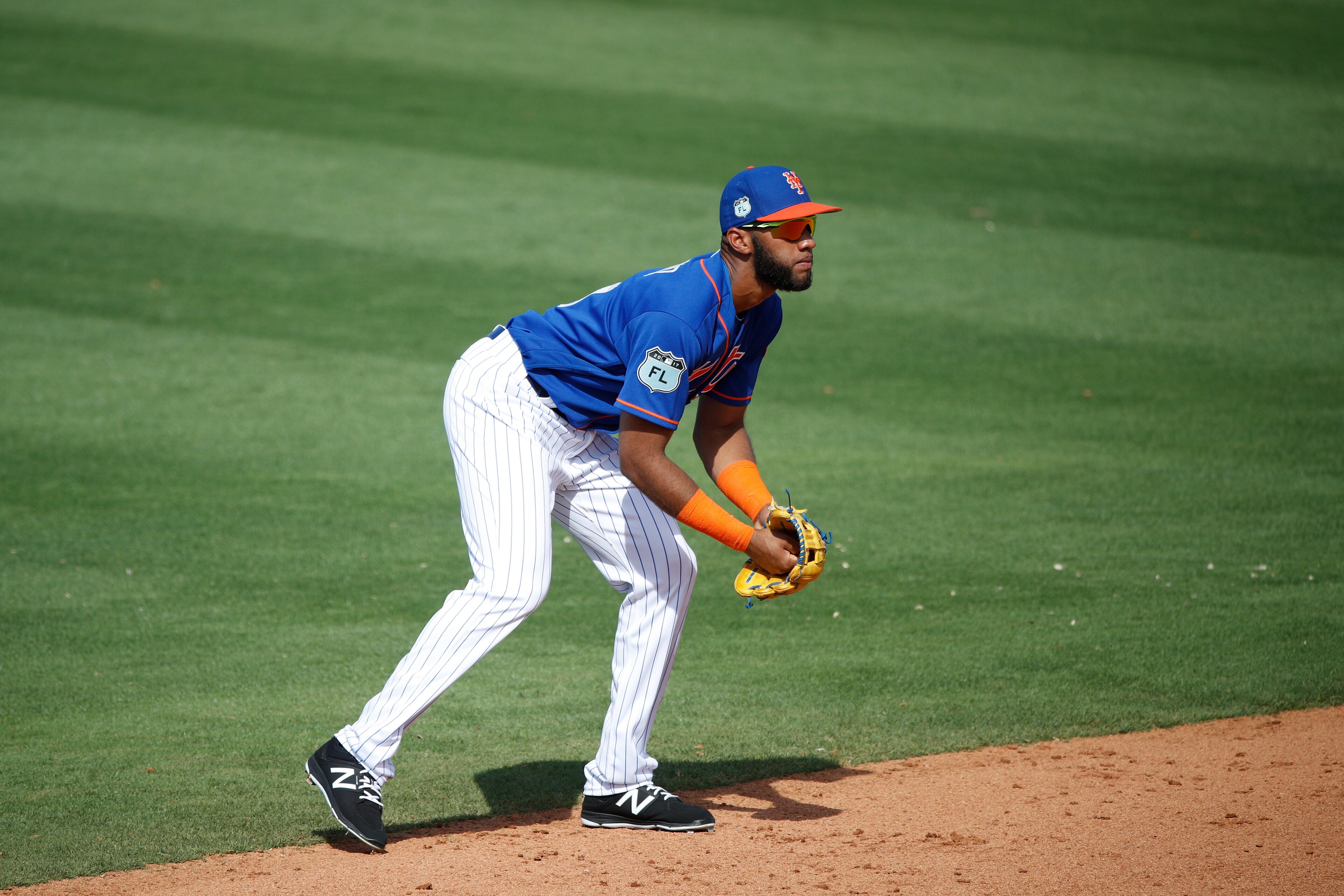 PORT ST. LUCIE, FL - FEBRUARY 27: Amed Rosario #61 of the New York Mets fields his position during a Grapefruit League spring training game against the Houston Astros at Tradition Field on February 27, 2017 in Port St. Lucie, Florida. The Astros defeated 