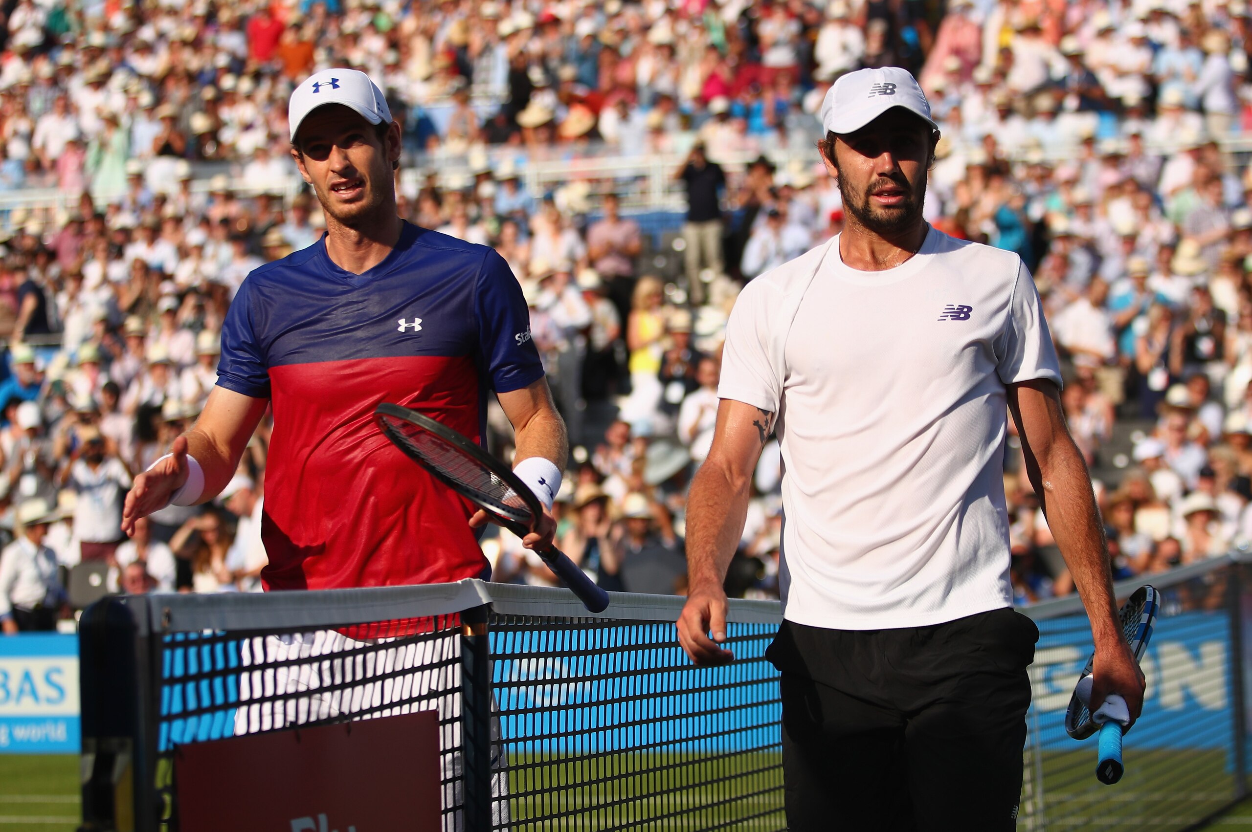 LONDON, ENGLAND - JUNE 20:  Winner, Jordan Thompson of Australia (R) speaks with runner up, Andy Murray of Great Britain (R) following their mens singles first round match on day two of the 2017 Aegon Championships at Queens Club on June 20, 2017 in Londo