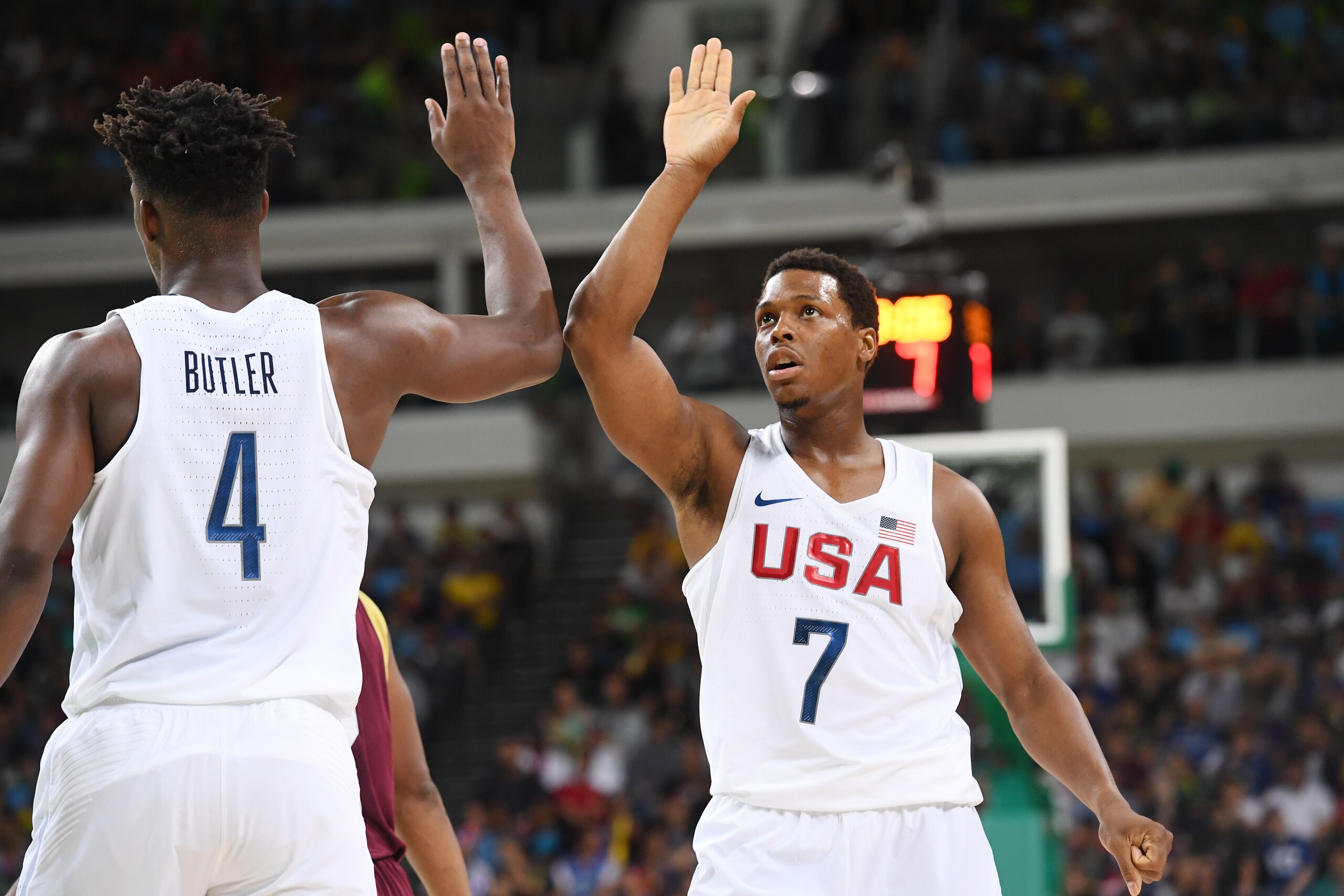 RIO DE JANEIRO, BRAZIL - AUGUST 8:  Kyle Lowry #7 shakes hands with Jimmy Butler #4 of the USA Basketball Men's National Team during the game against Venezuela on Day 3 of the Rio 2016 Olympic Games at Carioca Arena 1 on August 8, 2016 in Rio de Janeiro, 